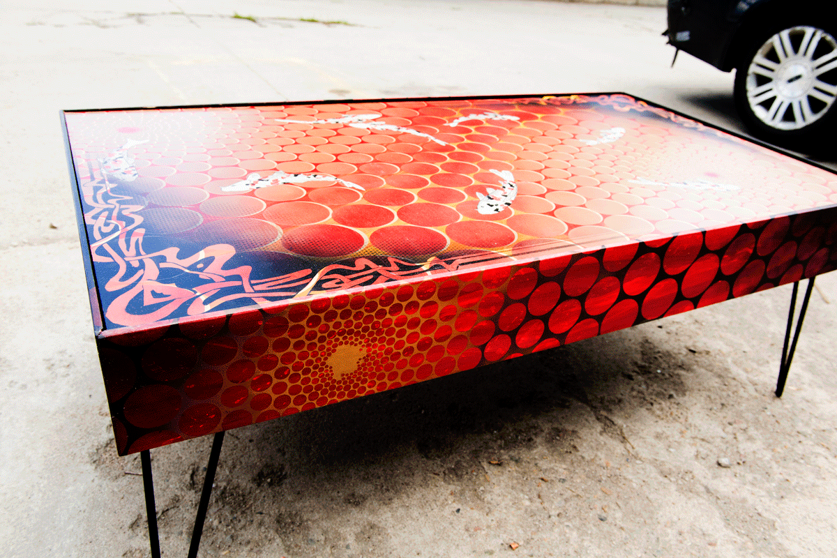  lavafish table  49"x27"x18"tall  mixed media on maple panel with steel hairpin legs.    