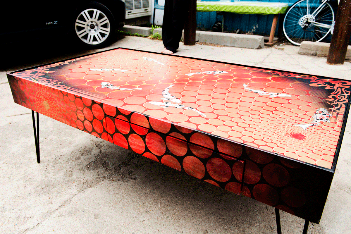  lavafish table  49"x27"x18"tall  mixed media on maple panel with steel hairpin legs.    