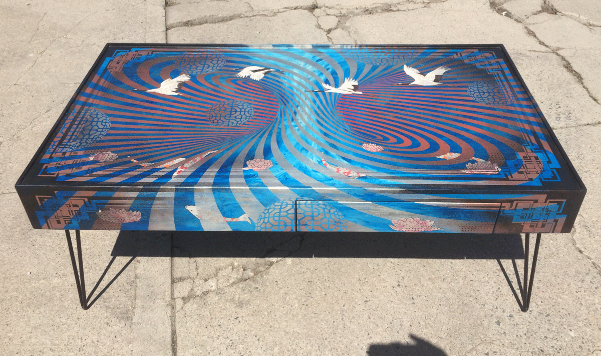  katy’s monster  commissioned coffee table measuring 49"x27"x18" tall  mixed media on maple panels with steel hairpin legs. 