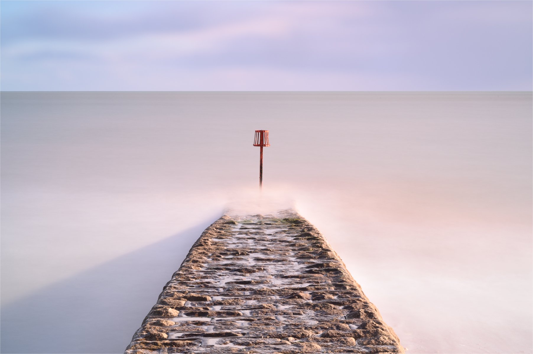 Jetty In The Sea by Jay Hallsworth