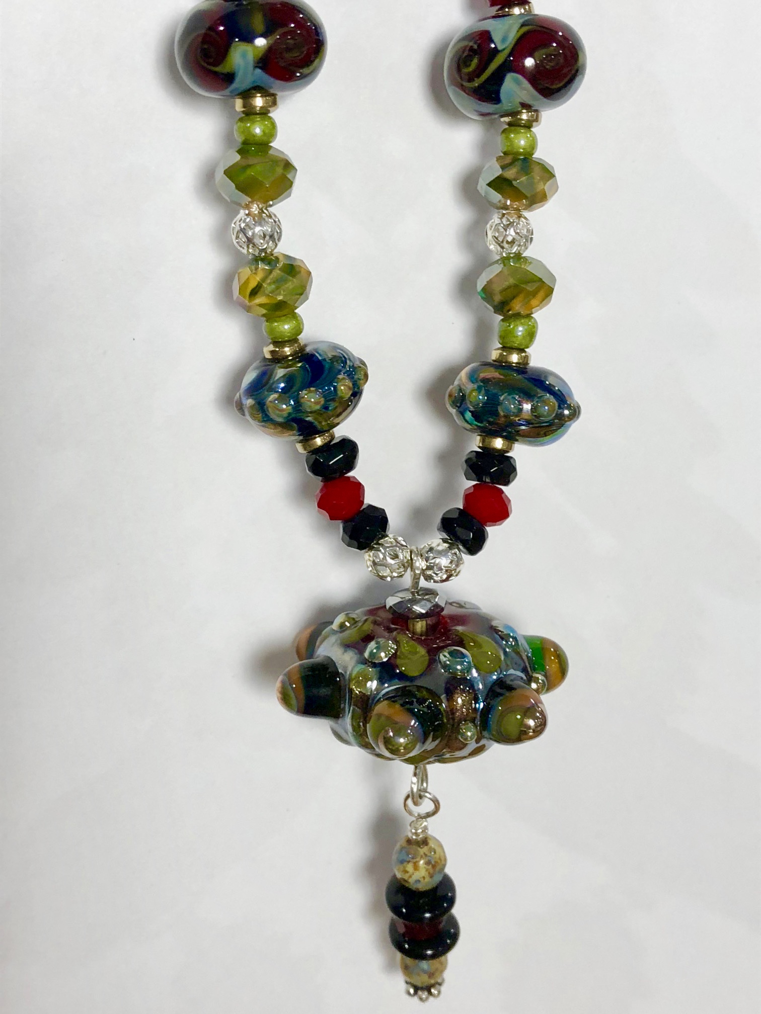 30" long necklace with 15 handmade beads