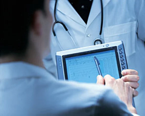 Doctor holding electronic chart