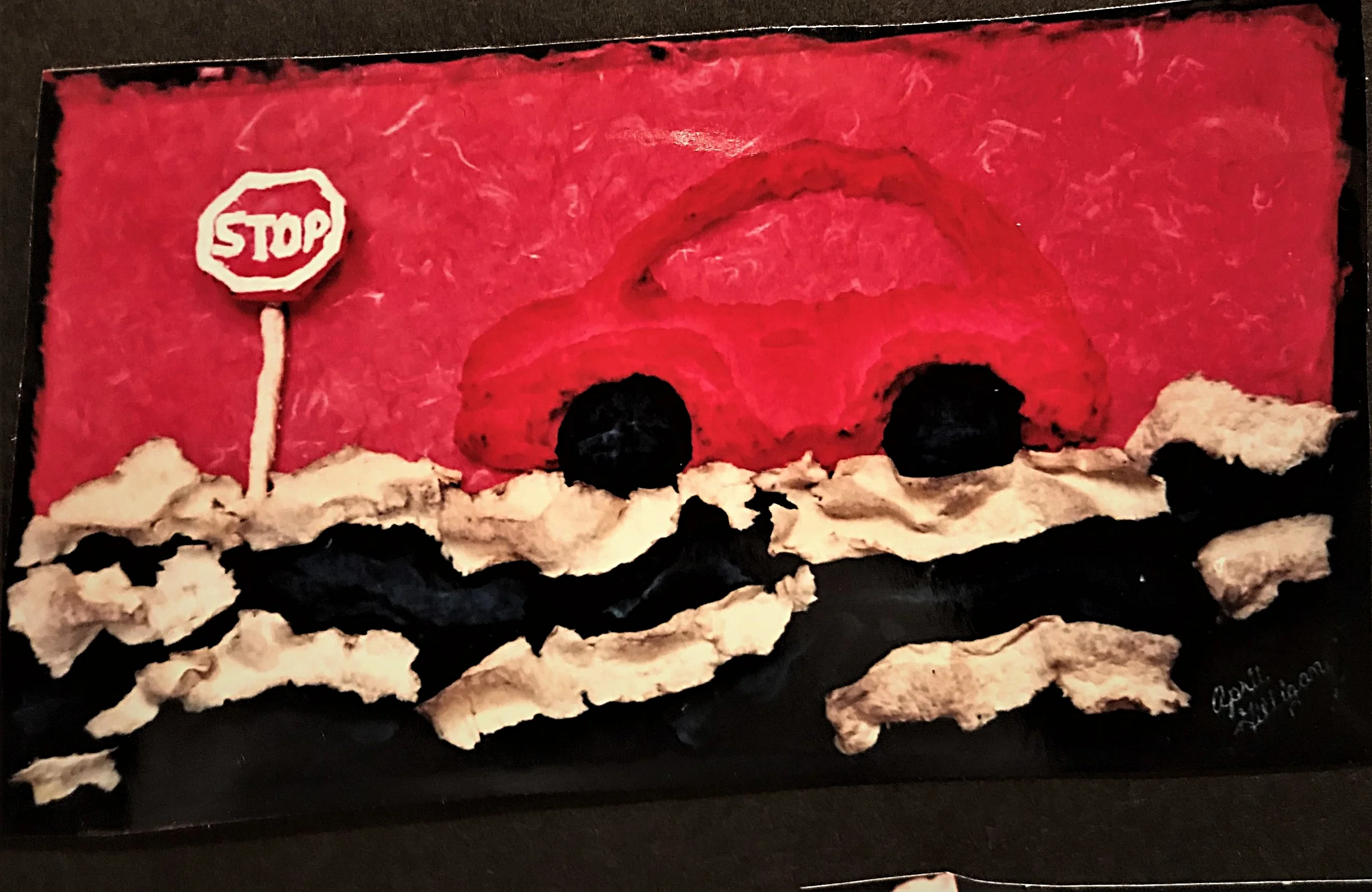 Red VW at a Stop sign