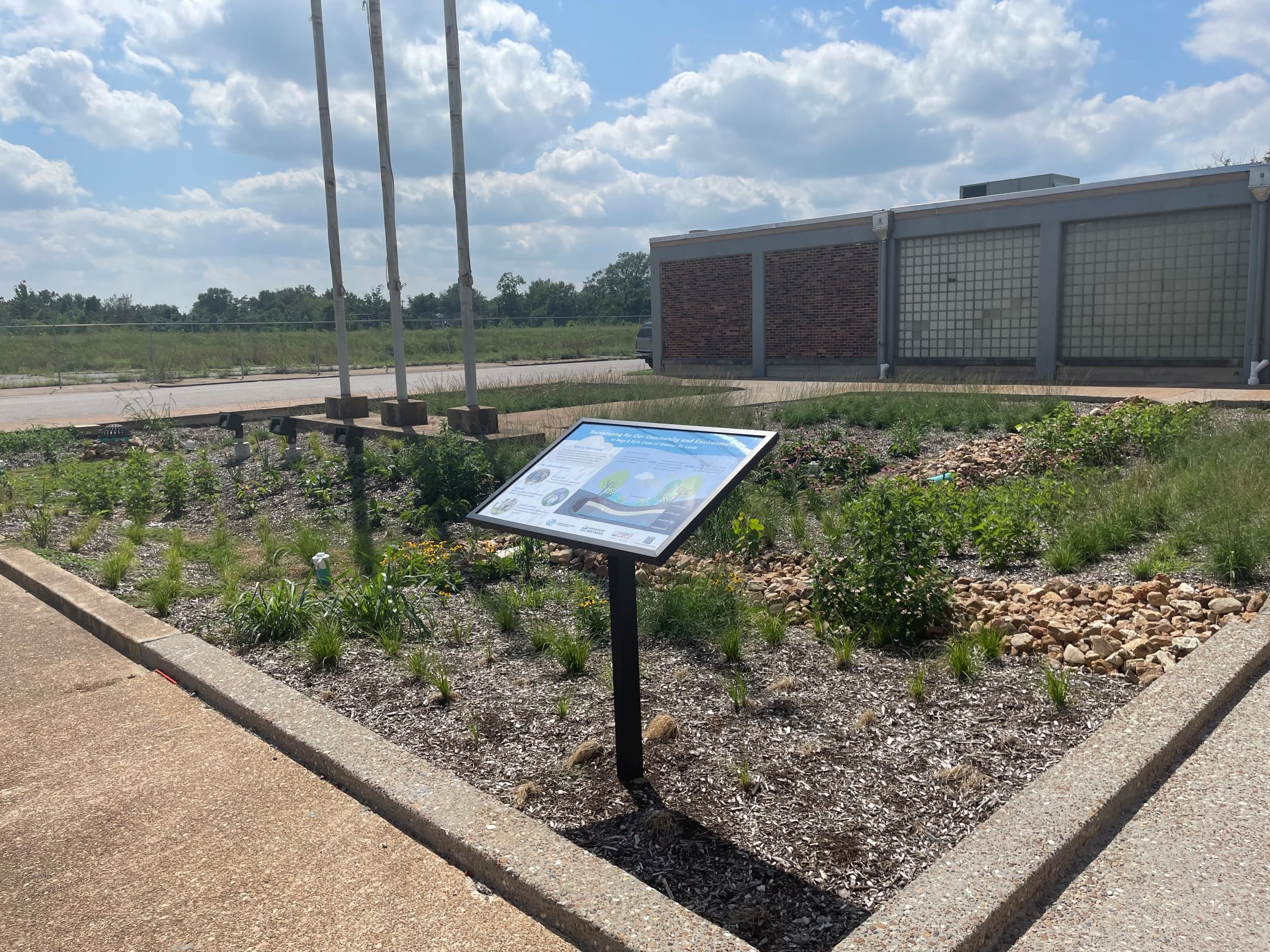 Rain garden and educational sign at the Boys &amp; Girls Club of Greater St. Louis, Herbert Hoover Club