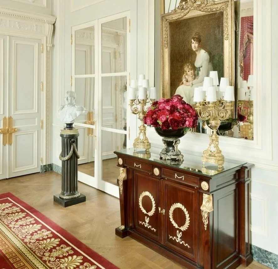 One of the salons at the Ritz Hotel in Paris features mirrored doors.