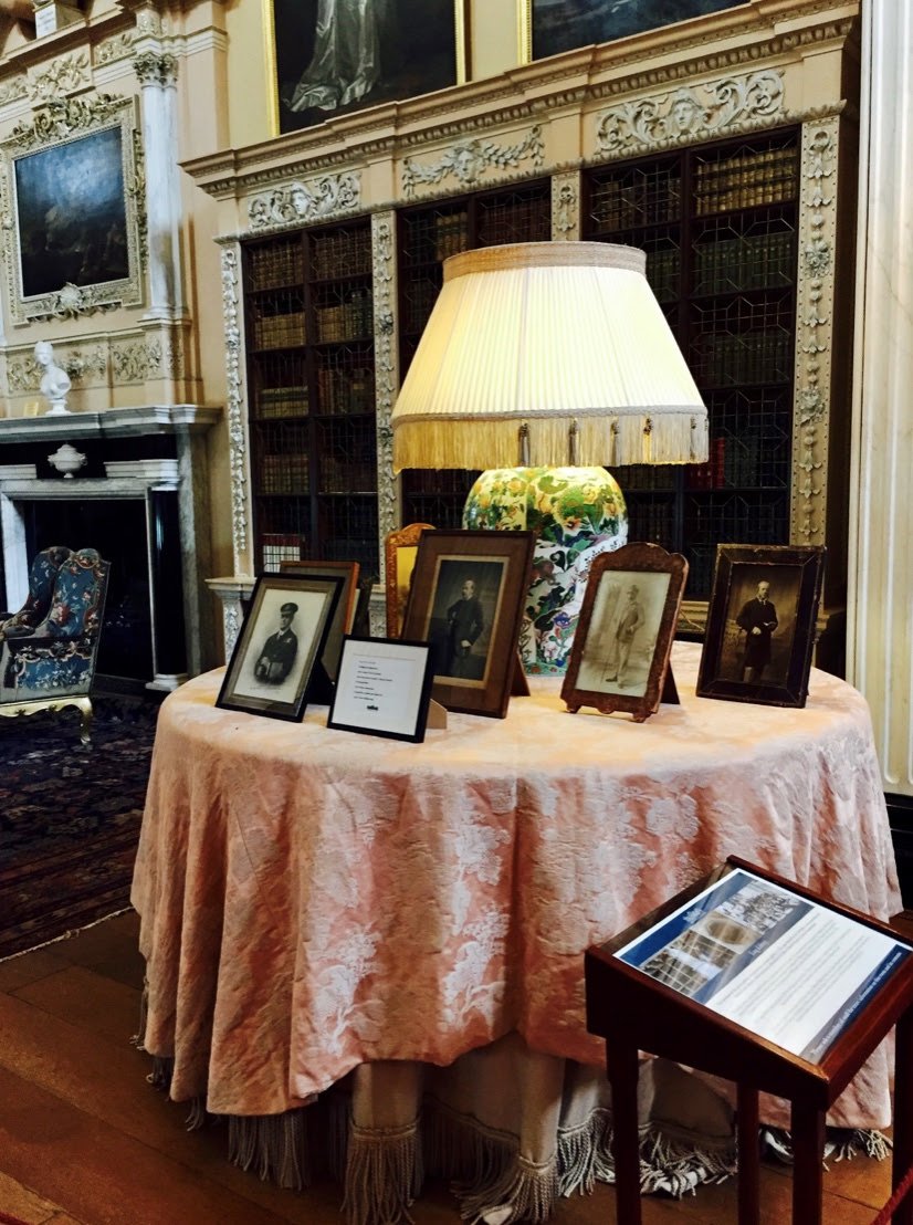 A skirted table, with an additional damask overlay, sits brilliantly in the Long Library at Blenheim Palace, in Woodstock, England.