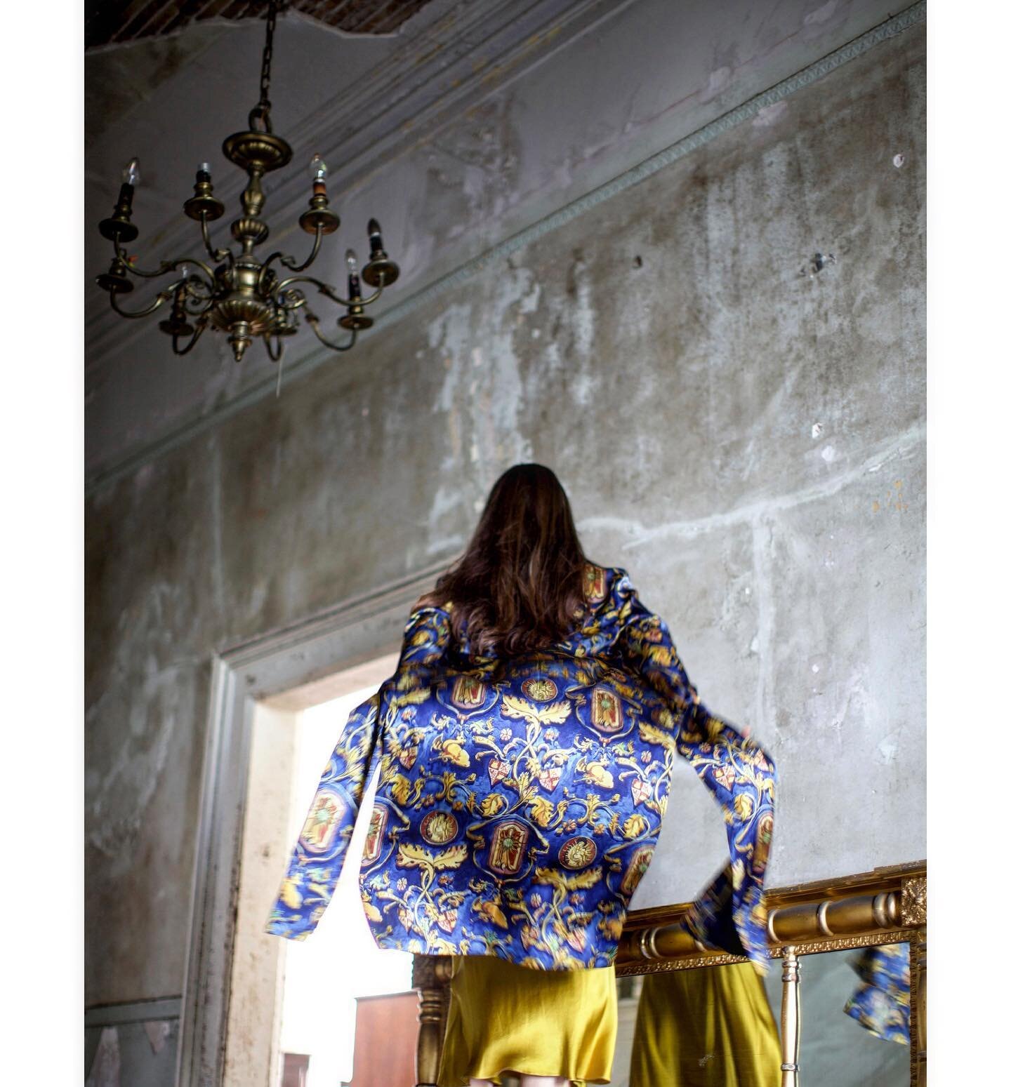 The medieval blue of shadows, drawn from the Virgin&rsquo;s palette and the Saint&rsquo;s sorrow, the poet&rsquo;s ink and the midnight sea.  An illuminated manuscript in lapis and gold silk.  This is the St. Tulicarpa Scheherazade coat.  Handcrafted