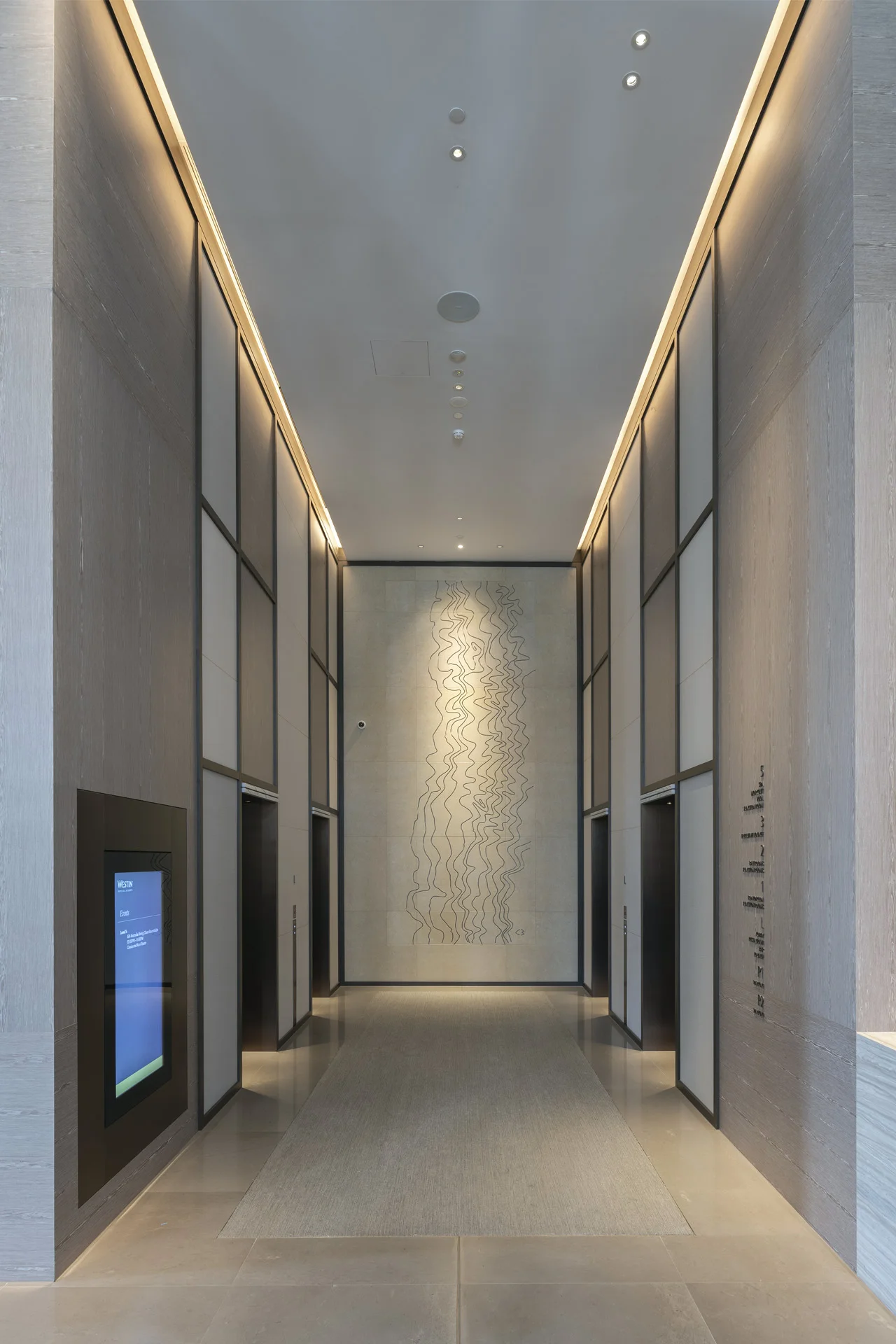 ‘Driftwood’ 2018 Relief sculpture in sandstone, 500 x 200cm installed in the main lift lobby