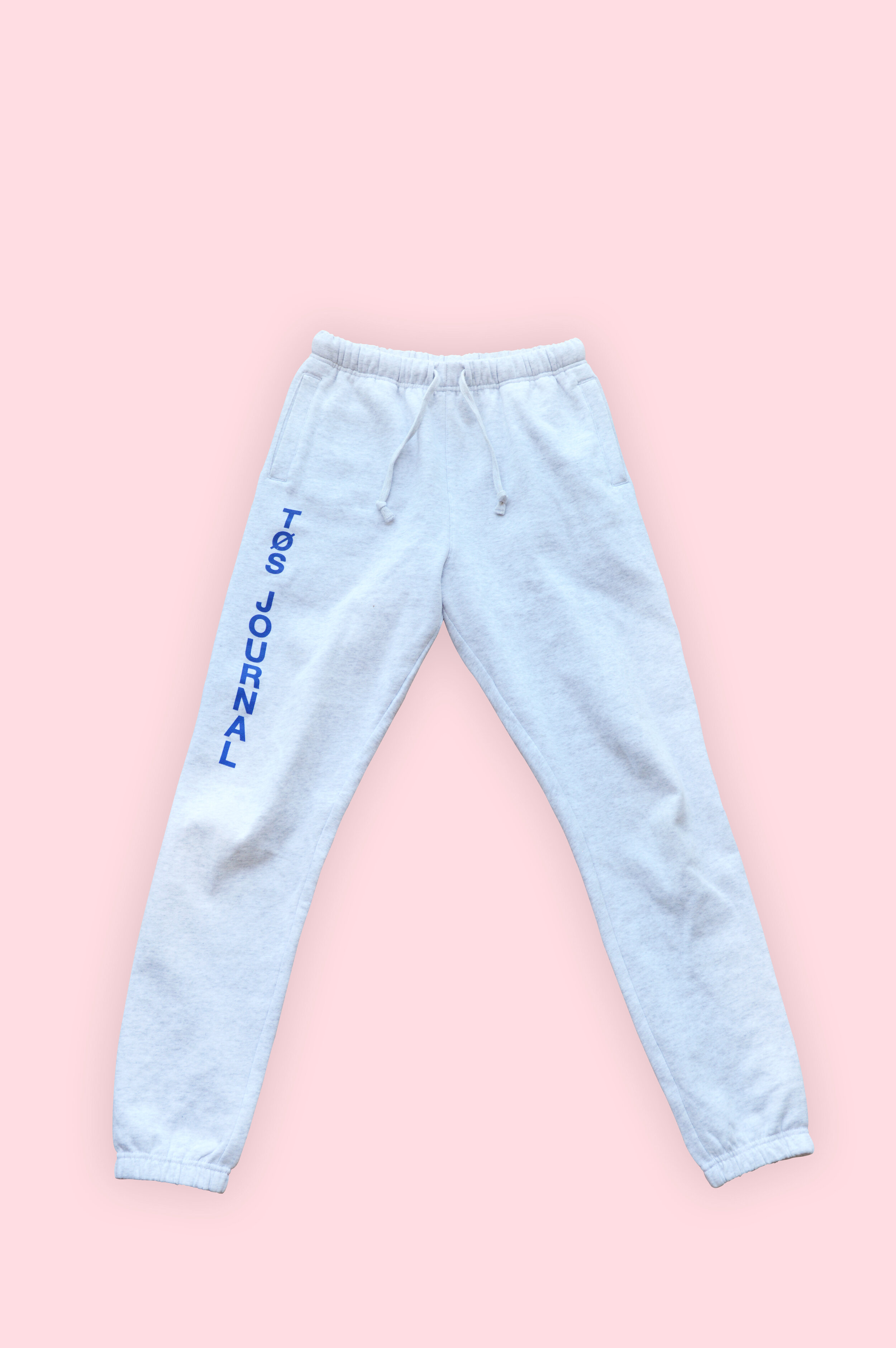 TØSLongTrackPants_DeepEtch_PinkBackground_Shadow.jpg