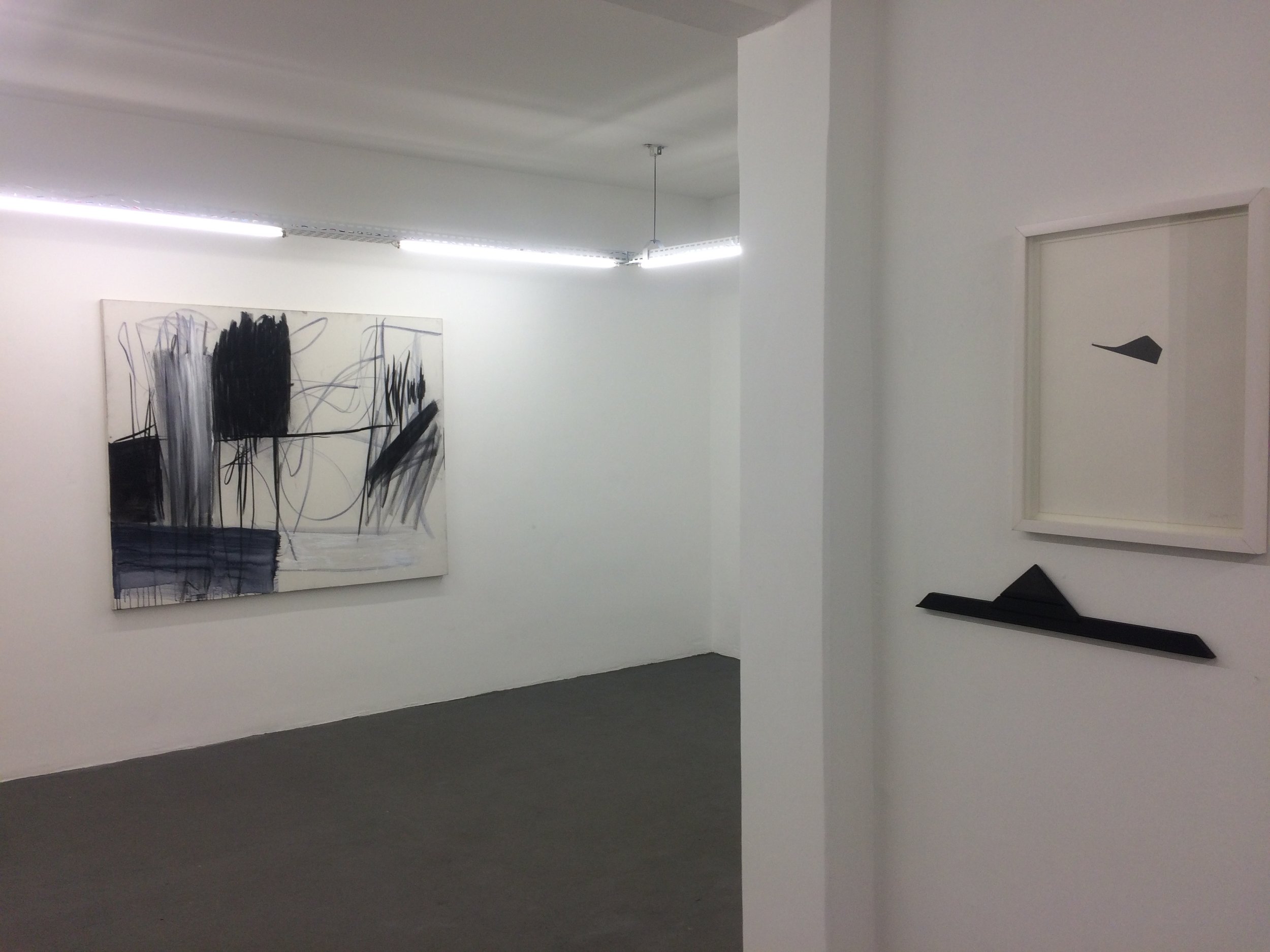 Inna Cymlich (Charcoal and oil on canvas) and Guita Soifer (Engraving and paint on wood)