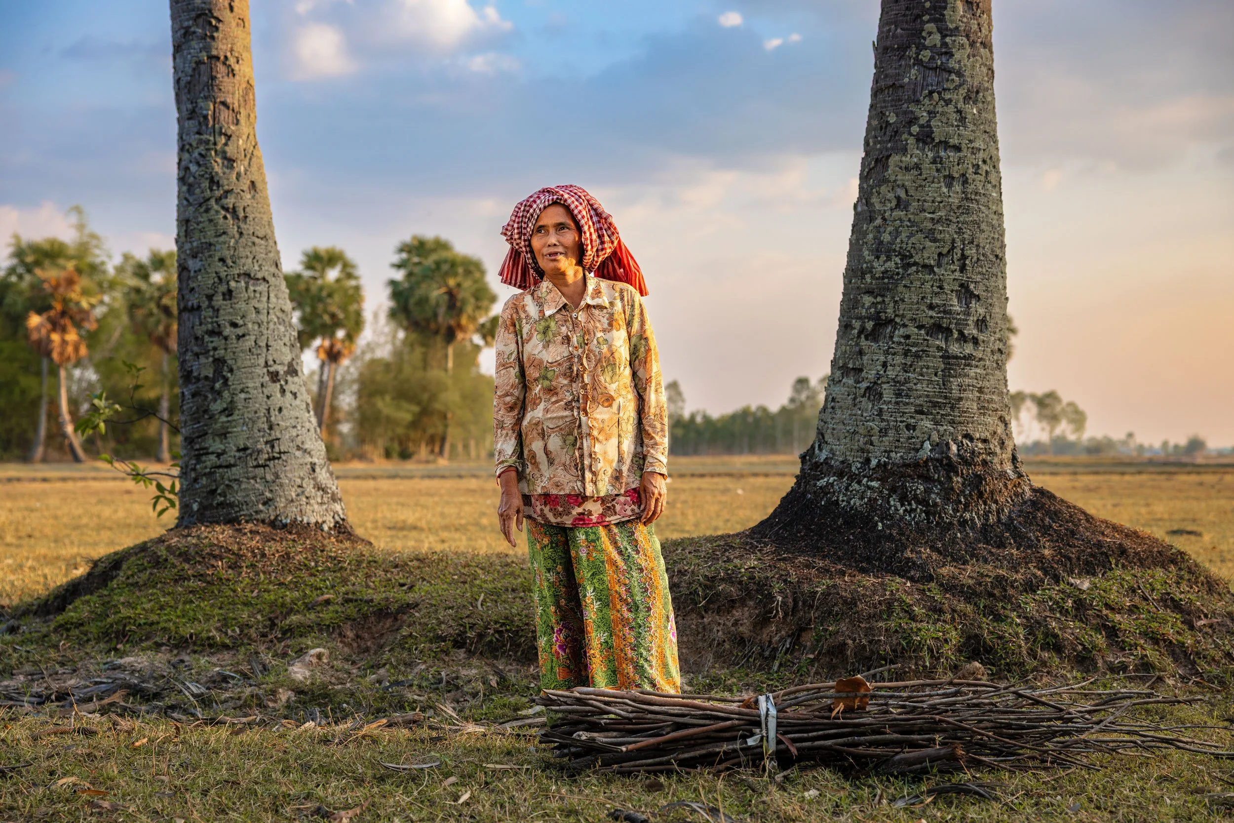  Resilience in the Rural Landscape — A portrait of a community member in Svay Rieng province, highlighting the human impact of market-driven sanitation and clean water access initiatives across Cambodia. 