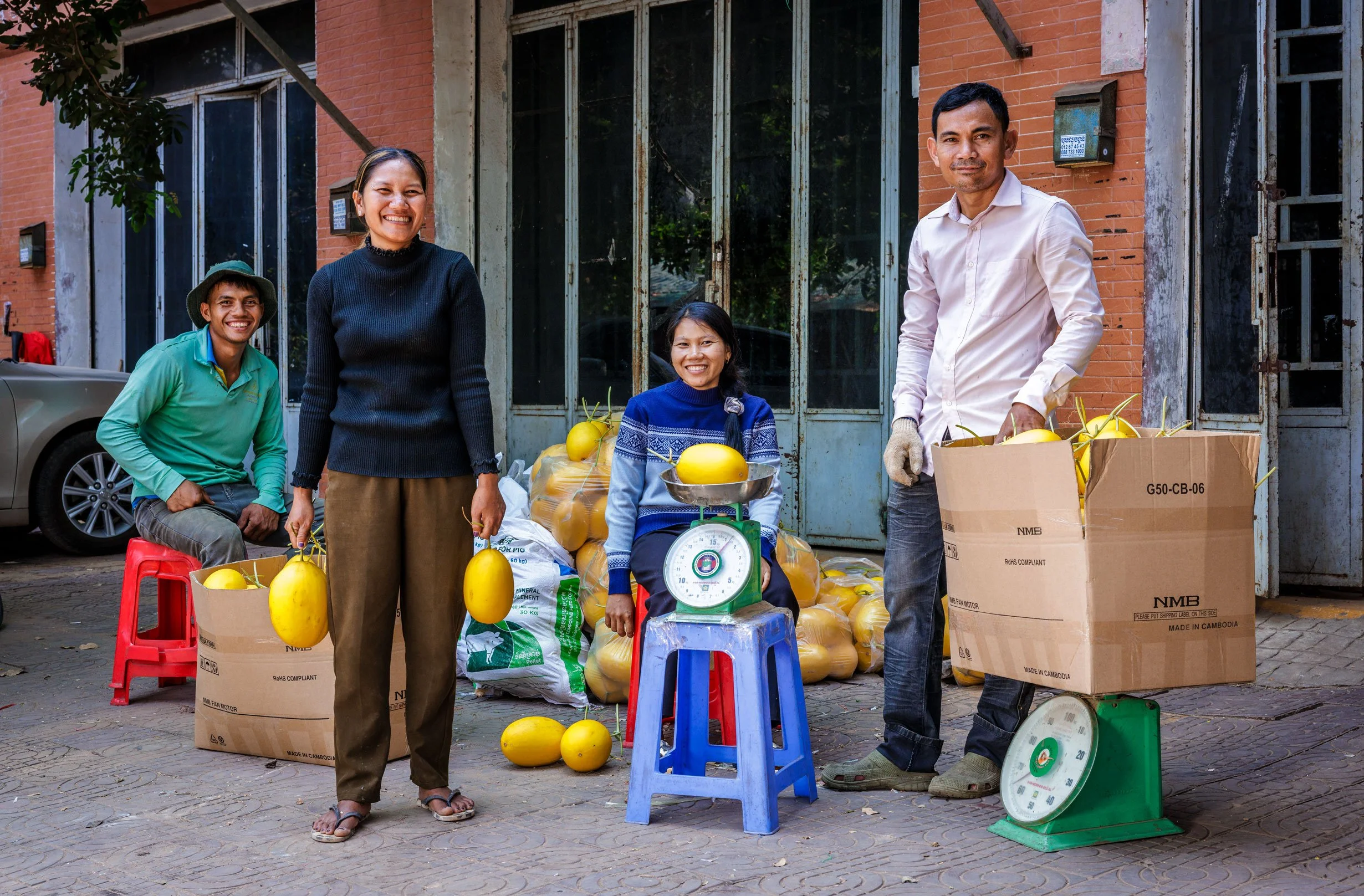  The Hub of Harvest — Documenting post-harvest logistics, weighing, and supply chain management at the MASC Melon Association distribution depot in partnership with iDE Cambodia. 