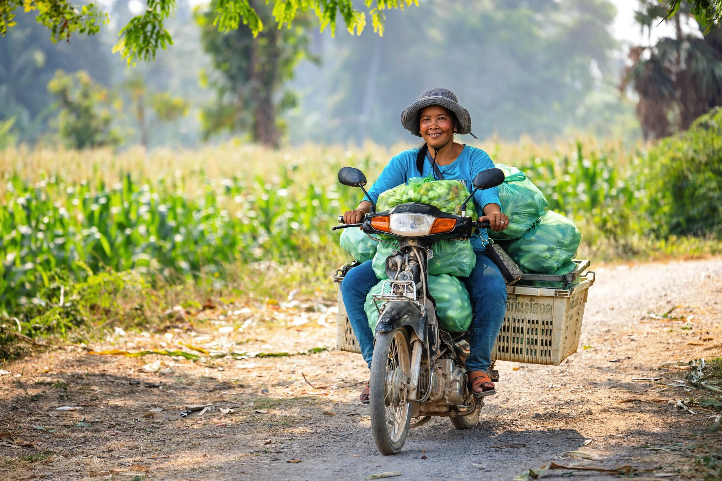  Market Connectivity — Documenting rural agricultural logistics and crop transport, showcasing smallholder farmers navigating local supply chains in partnership with iDE Cambodia. 
