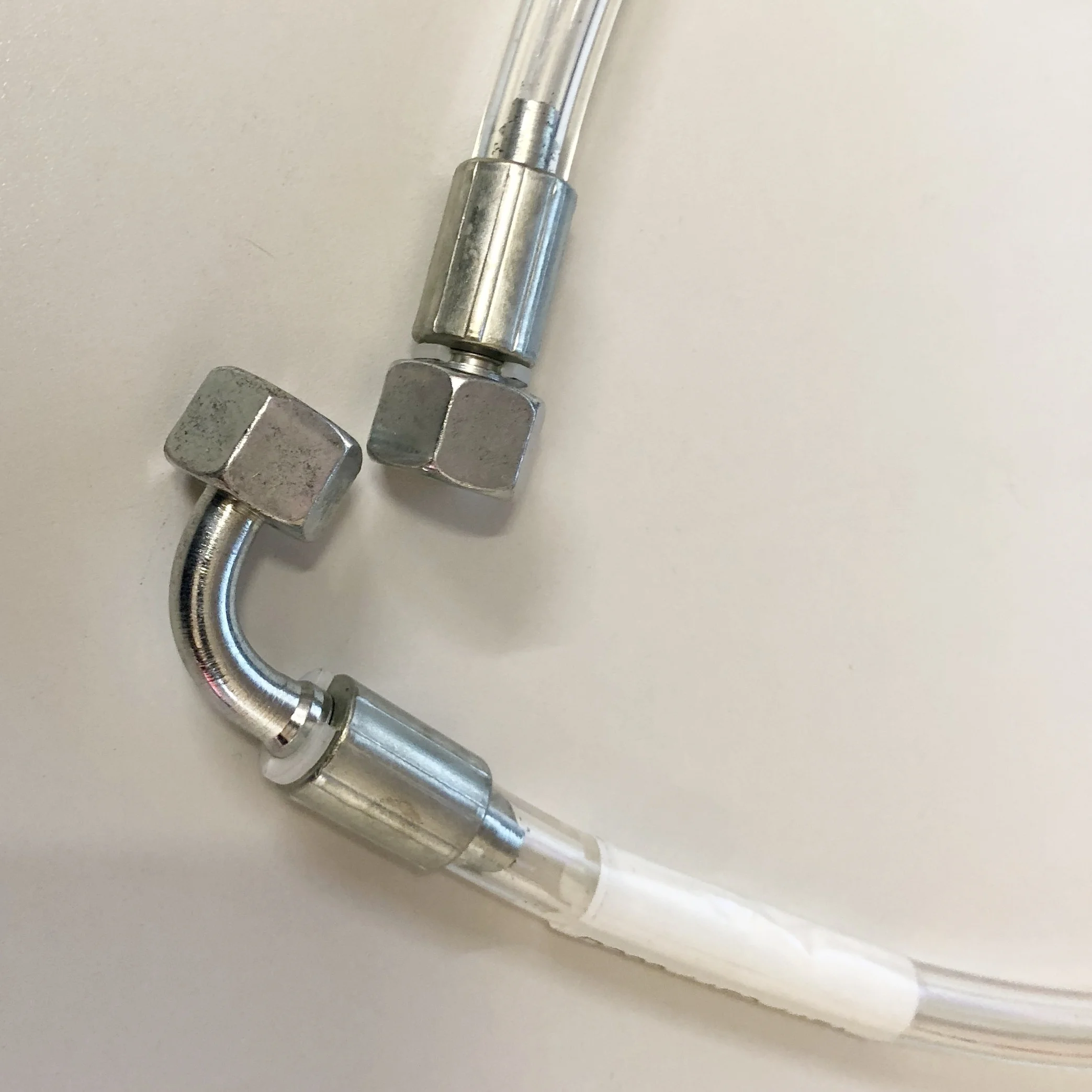 1/4" Female Elbow X 1/4" Female Straight 900mm Clear Oil Line (Mec) C/OIL/L02