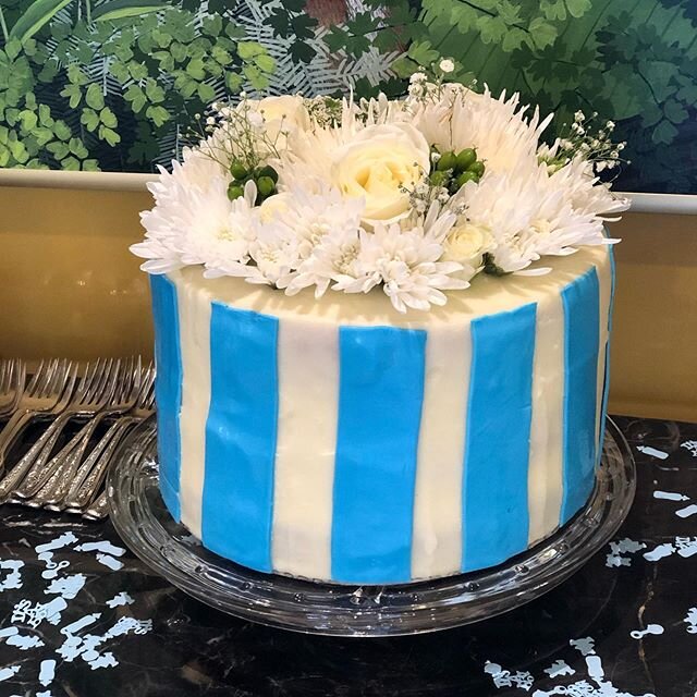 White flowers and blue stripes for a baby shower!