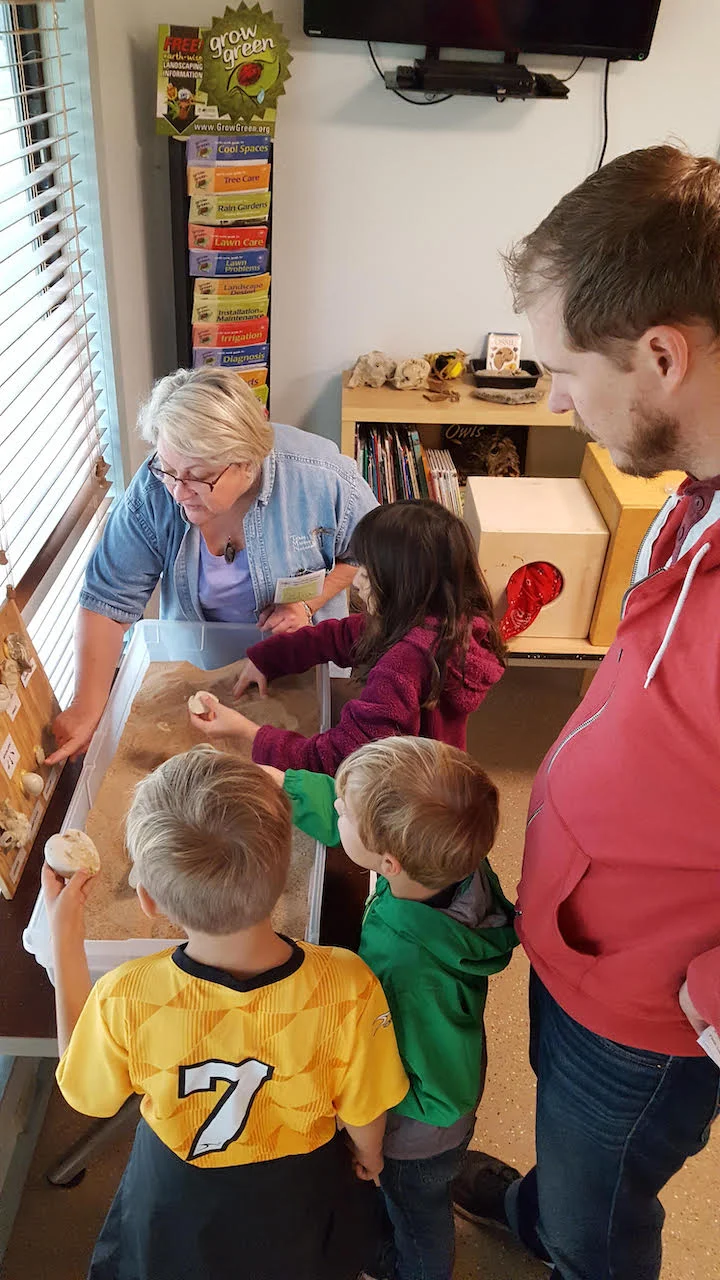 HCMN Celia Clowe working with Families at Jacob’s Well Nature Center.