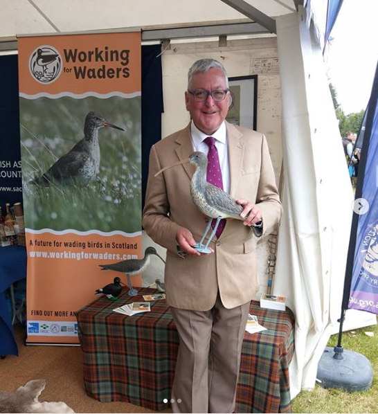 Fergus Ewing MSP shows an interest in Working for Waders at Moy in August