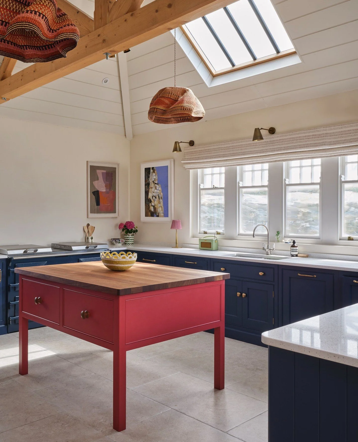 One of my favourite kitchens that I've been lucky enough to design. A slight New England vibe with the tongue &amp; groove on the ceiling and the coastal setting. The pendant lights were designed by me using beautiful artisan baskets from Ghana.⁠
⁠
?