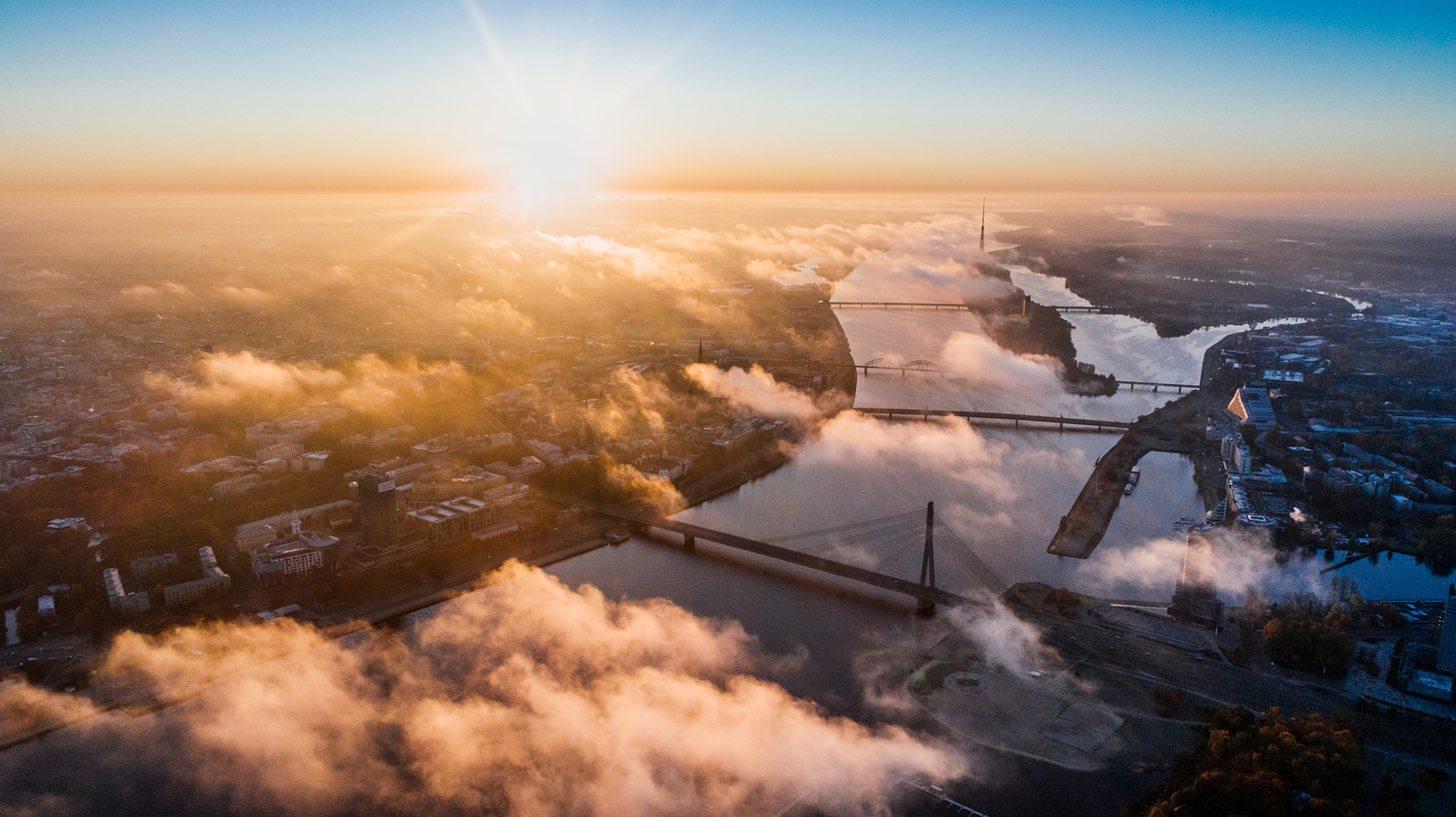 aerial-view-city-bridge-sunset-drone-alex-unsplash.png