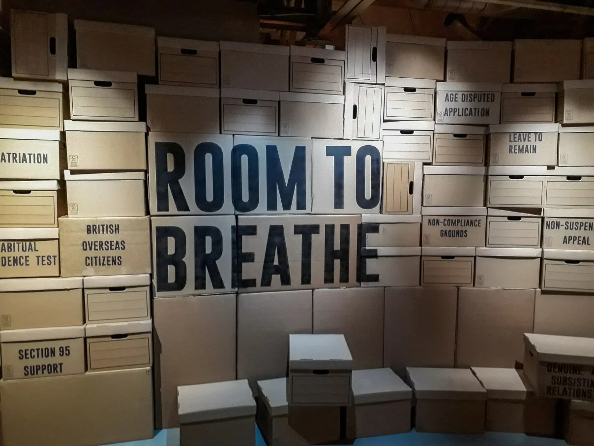 Image:   Room to Breathe  , a 2019 exhibition sharing migrant stories and artwork at the Migration Museum, London.