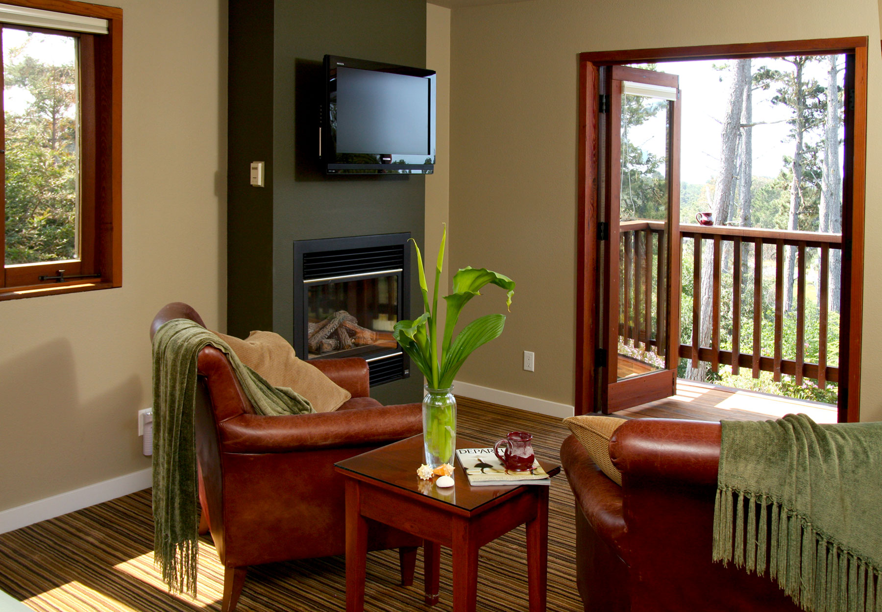 French doors open to the balcony with second floor view in the Osprey room