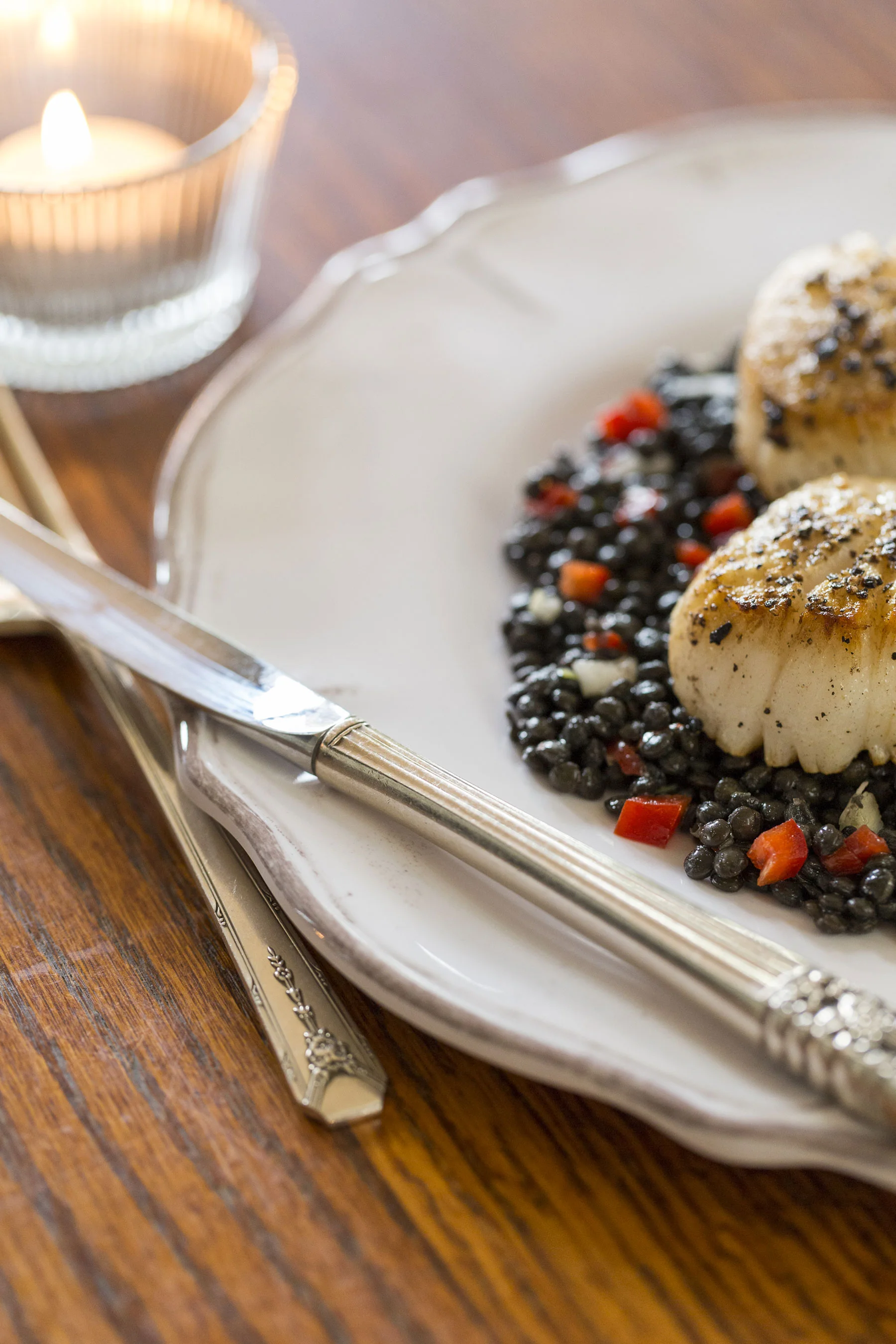 Scallops over lentils.
