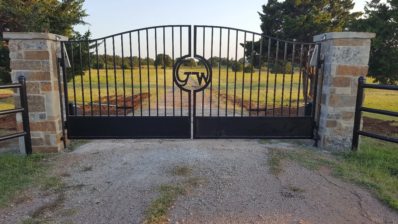 large ornamental gate to a residential driveway