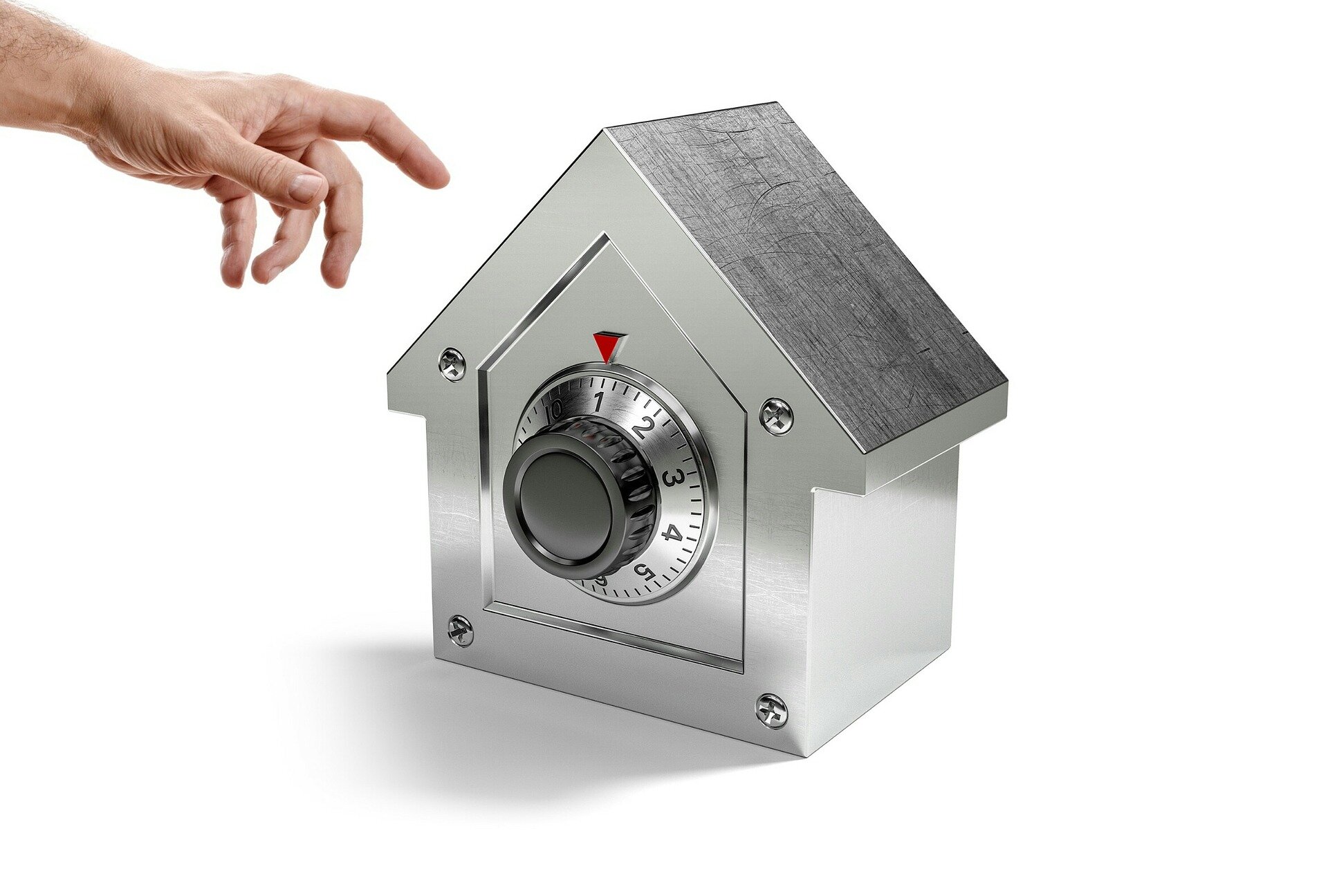hand reaching toward safe shaped like a house