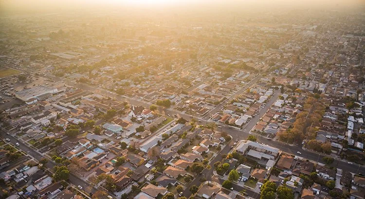 aerial view of a city at sunrise