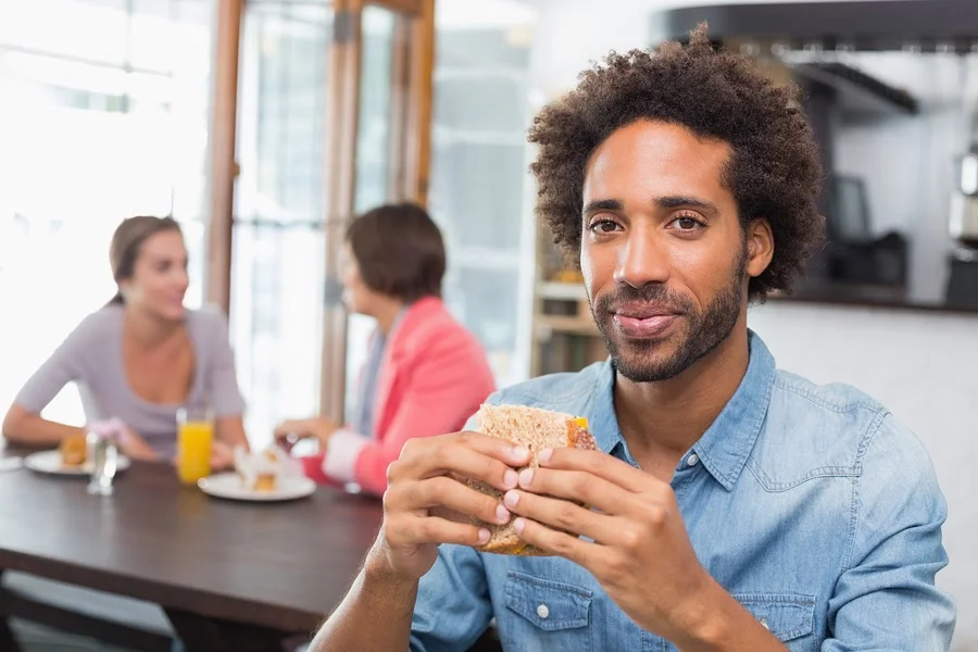 bigstock-Handsome-man-eating-a-sandwich-73046959-001.jpg