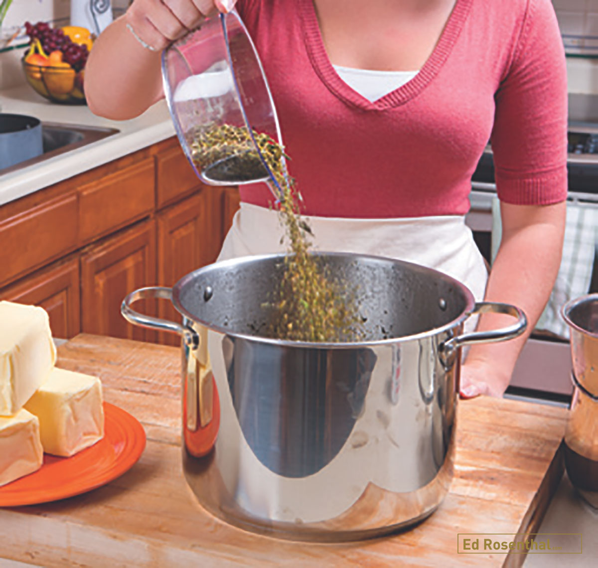 Pouring measured marijuana into cooking pot
