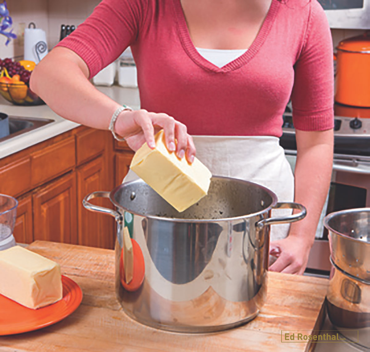  Putting butter into cooking pot