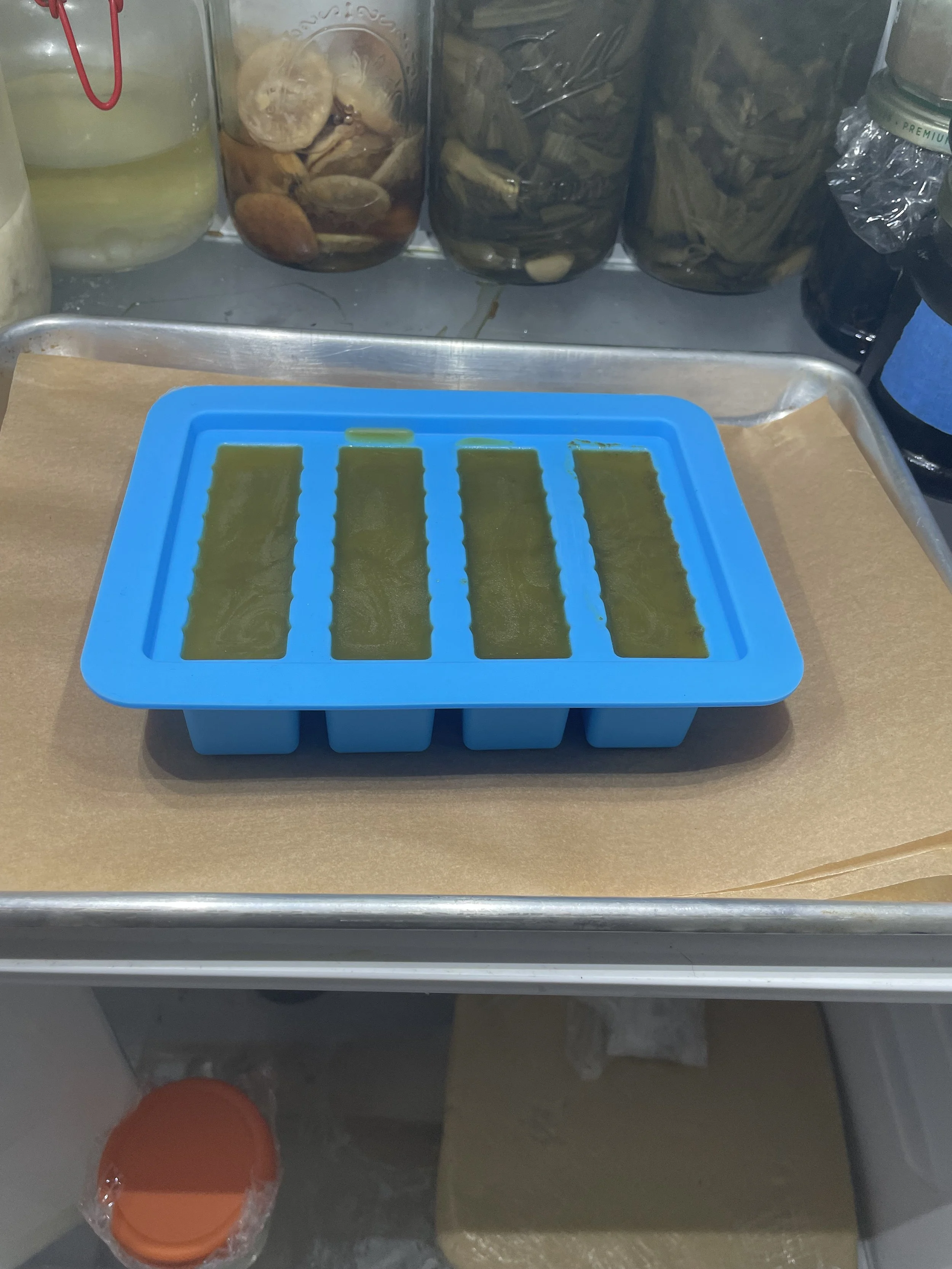 cooling-washed-cannabutter-in-silicone-molds-edible-storage