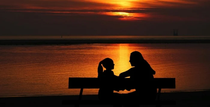 stockvault-mother-and-daughter-at-sunset252634.jpg