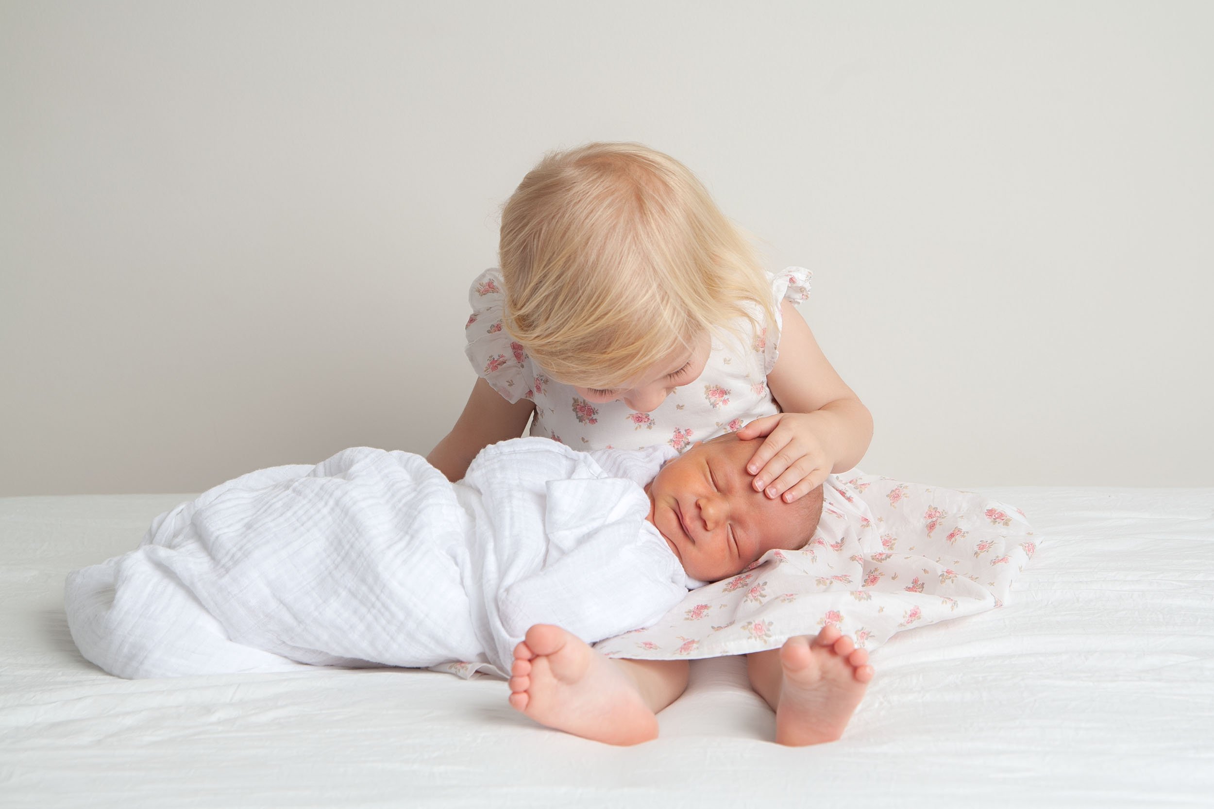 can older children be included in newborn portraits