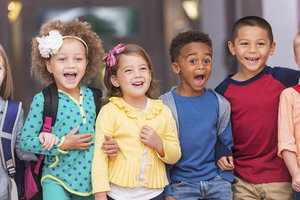 Multiracial group of children in preschool hallway (Copy)