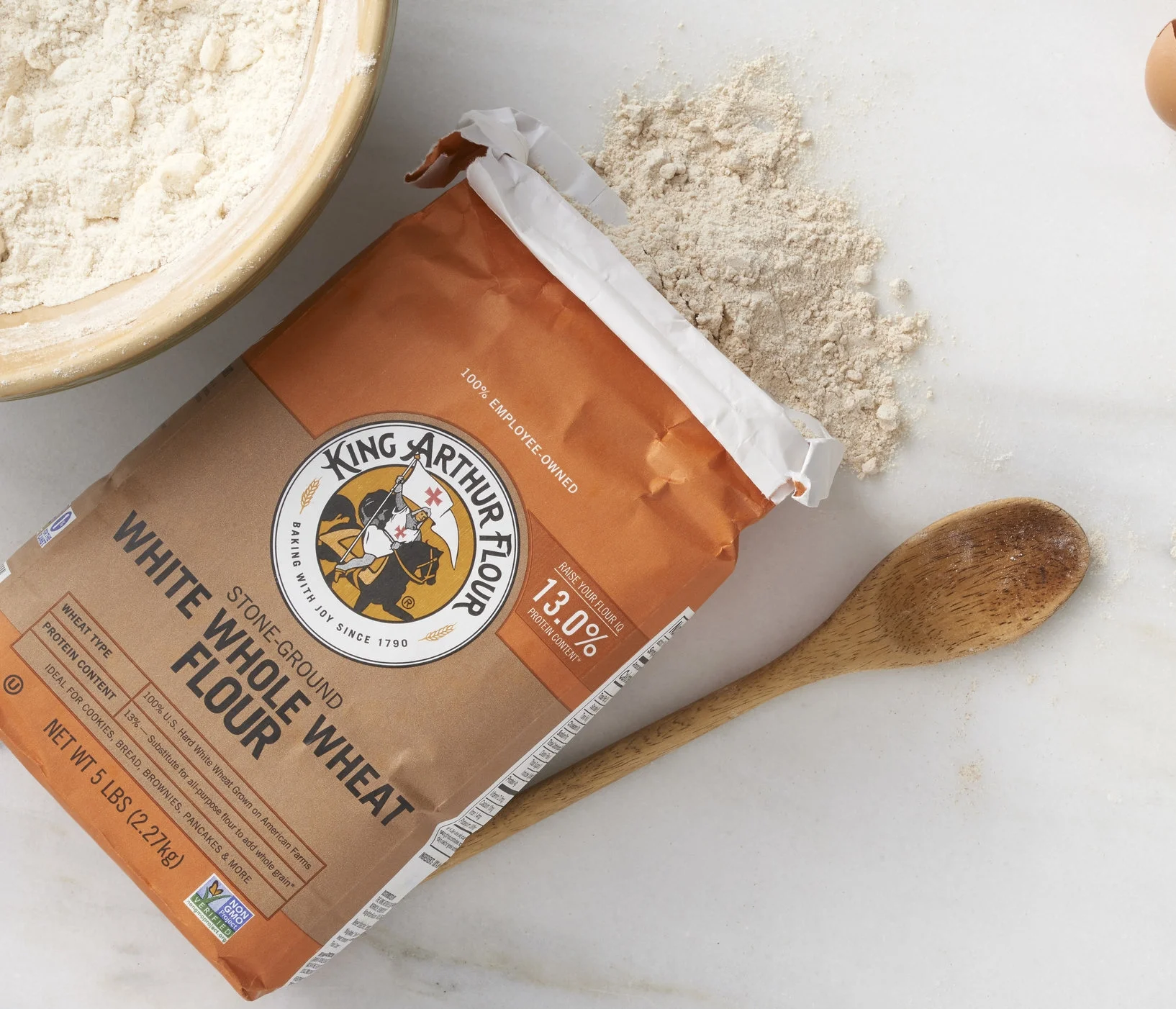King Arthur Flour’s Signature Flours redesign to follow the new marketing campaign: Flour IQ. White Whole Wheat Flour featured here. 5lb full line shown below.