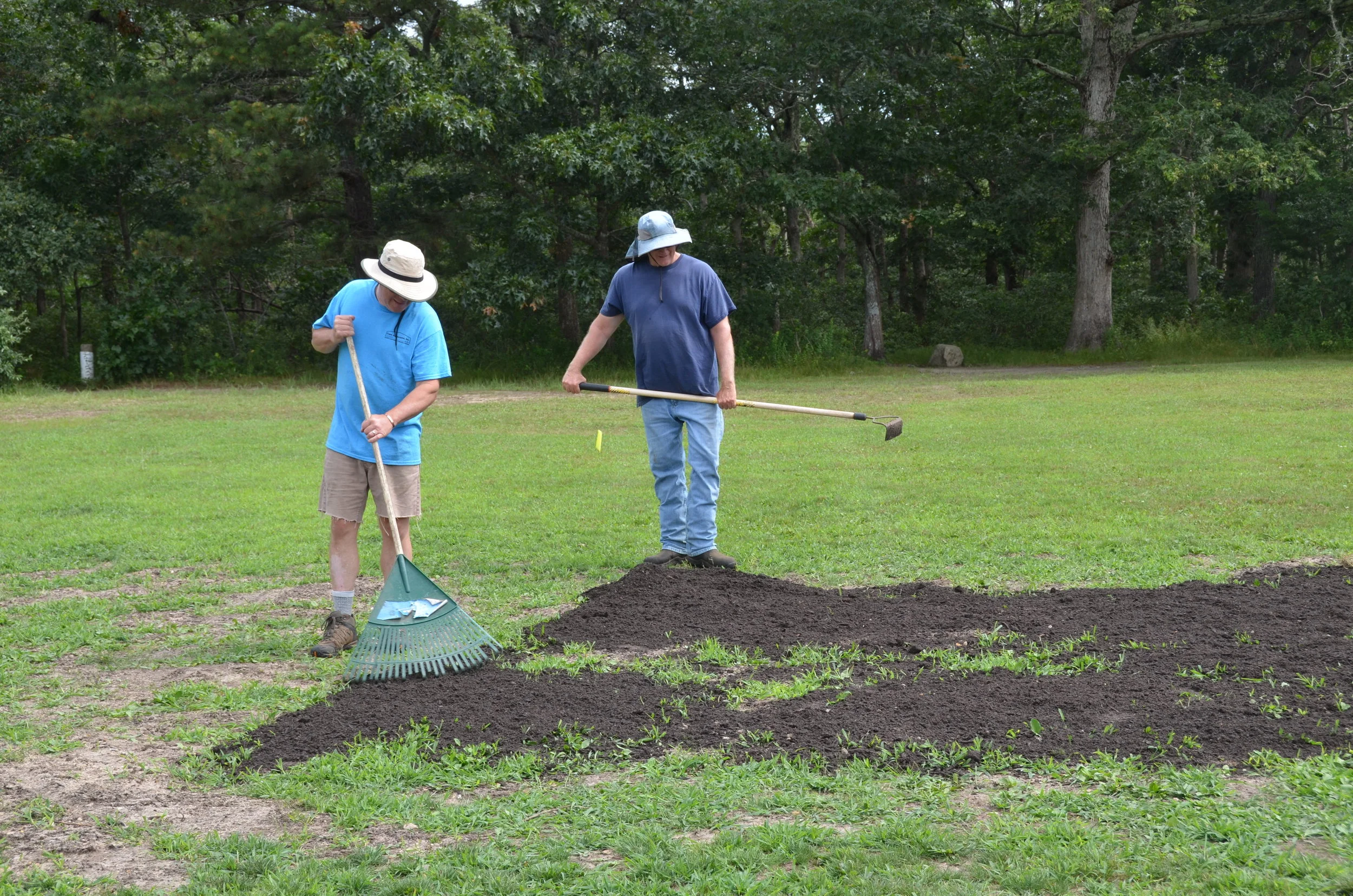 Spreading top soil