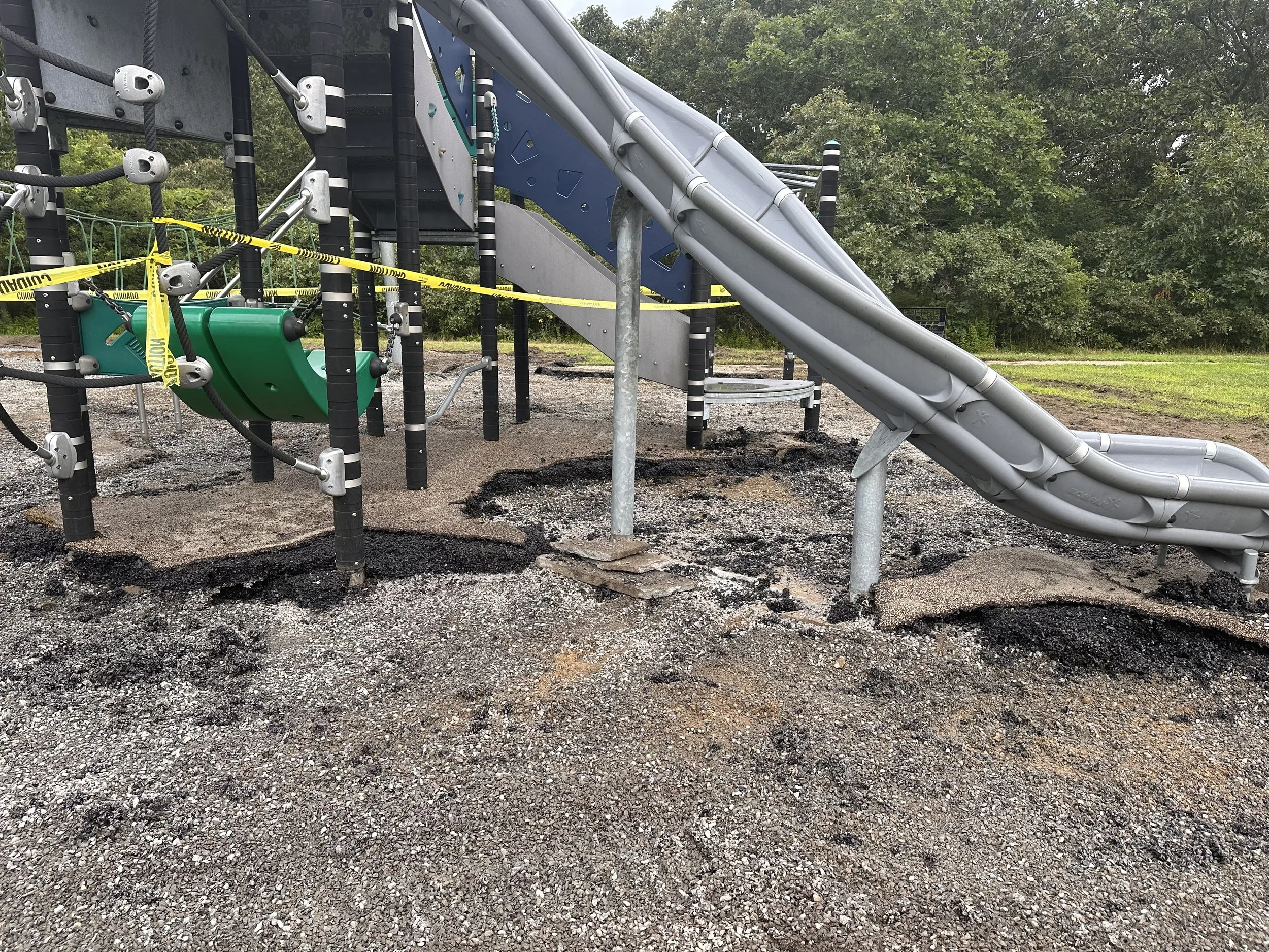 Removing the rubber surface and as much of the loose fill underneath as possible