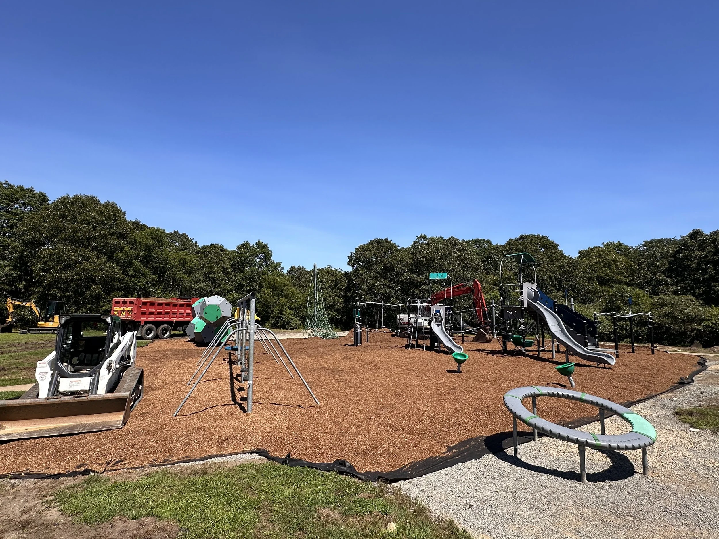 Triple chipped mulch from Keene's being spread