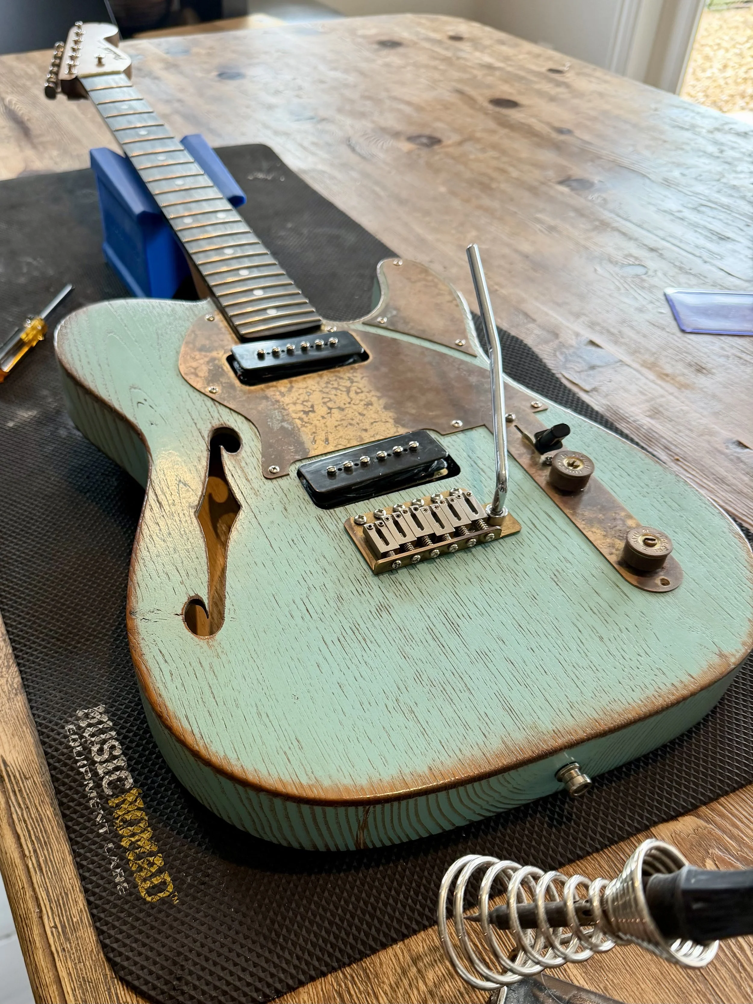 Guitar being prepared for a setup