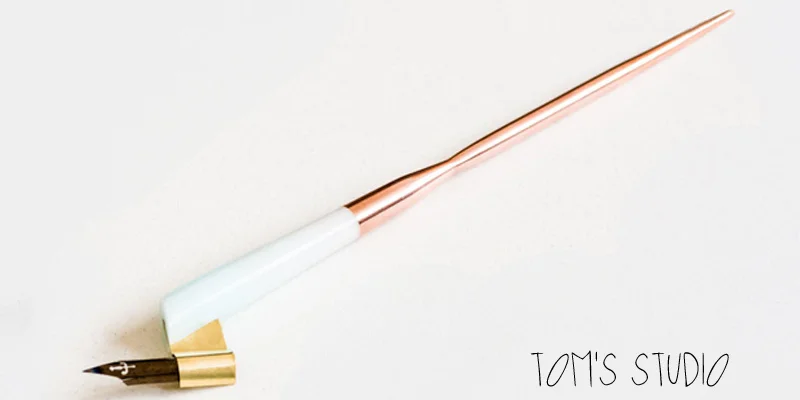 Tom's Studio oblique pen holder featuring solid copper
