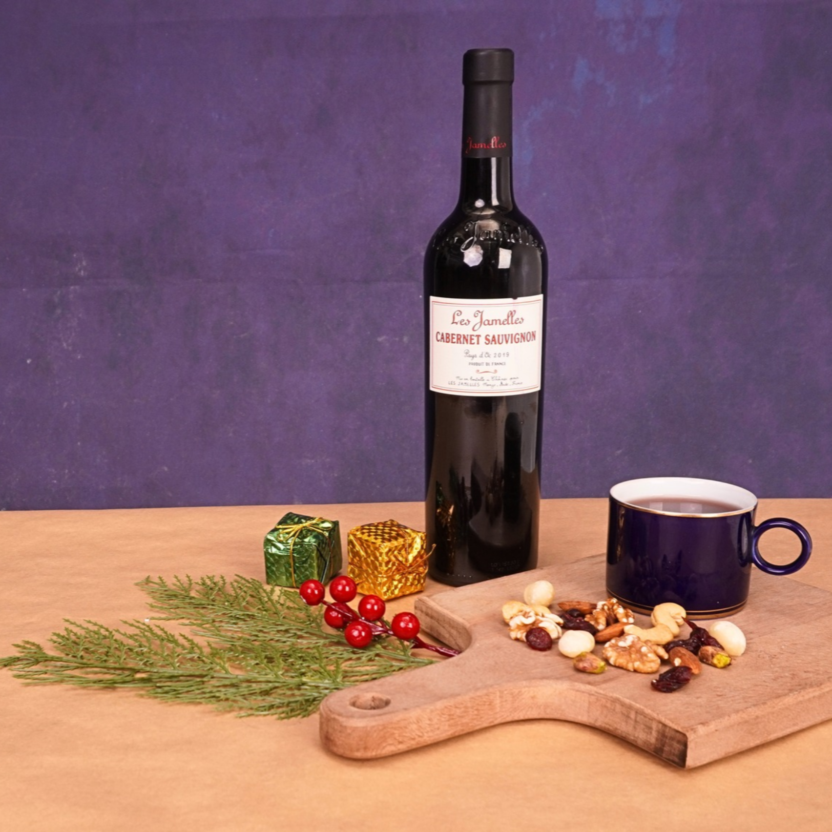 Red wine with baked nuts and dried fruits for the festive table