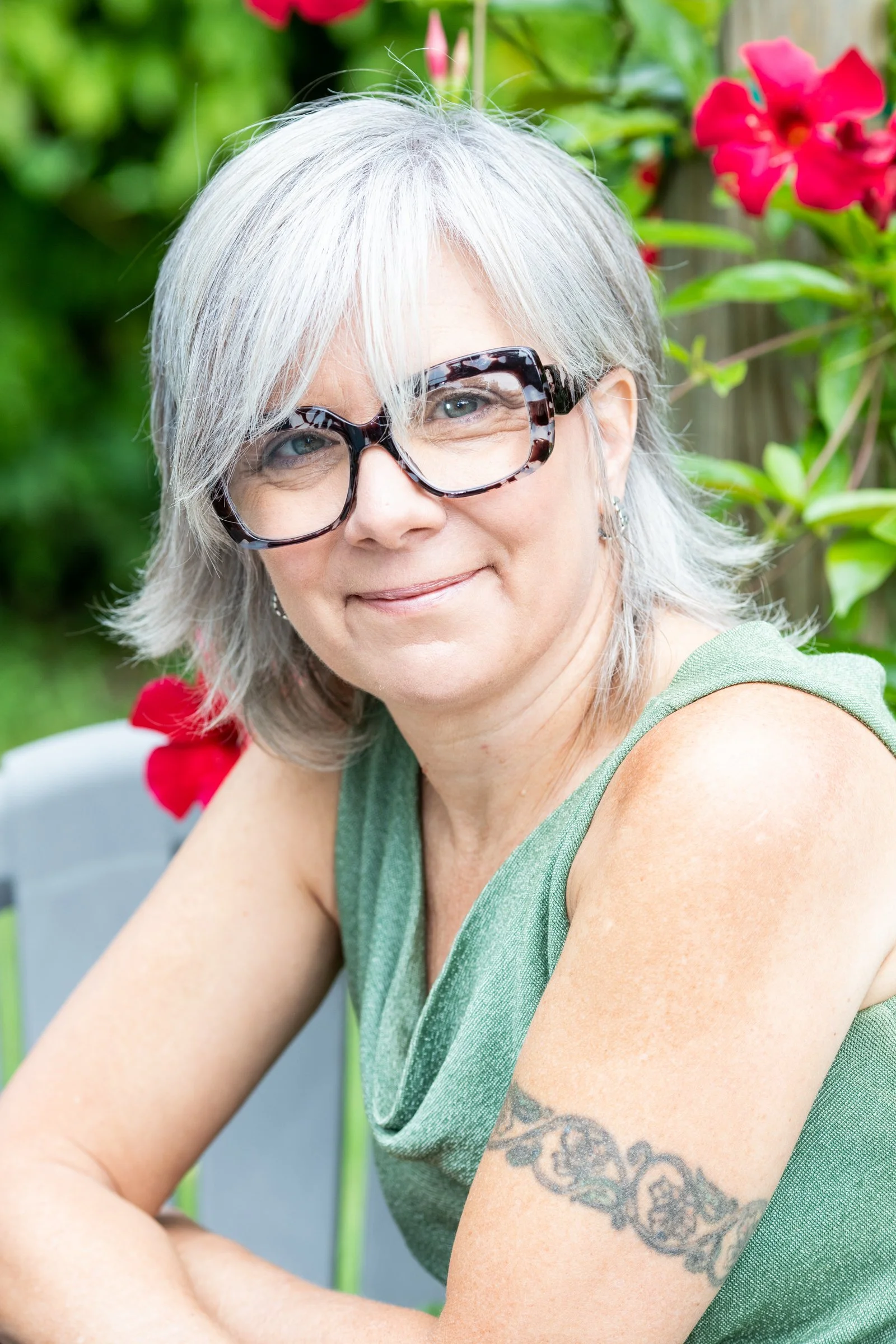ERIKA HIGGINS ROSS