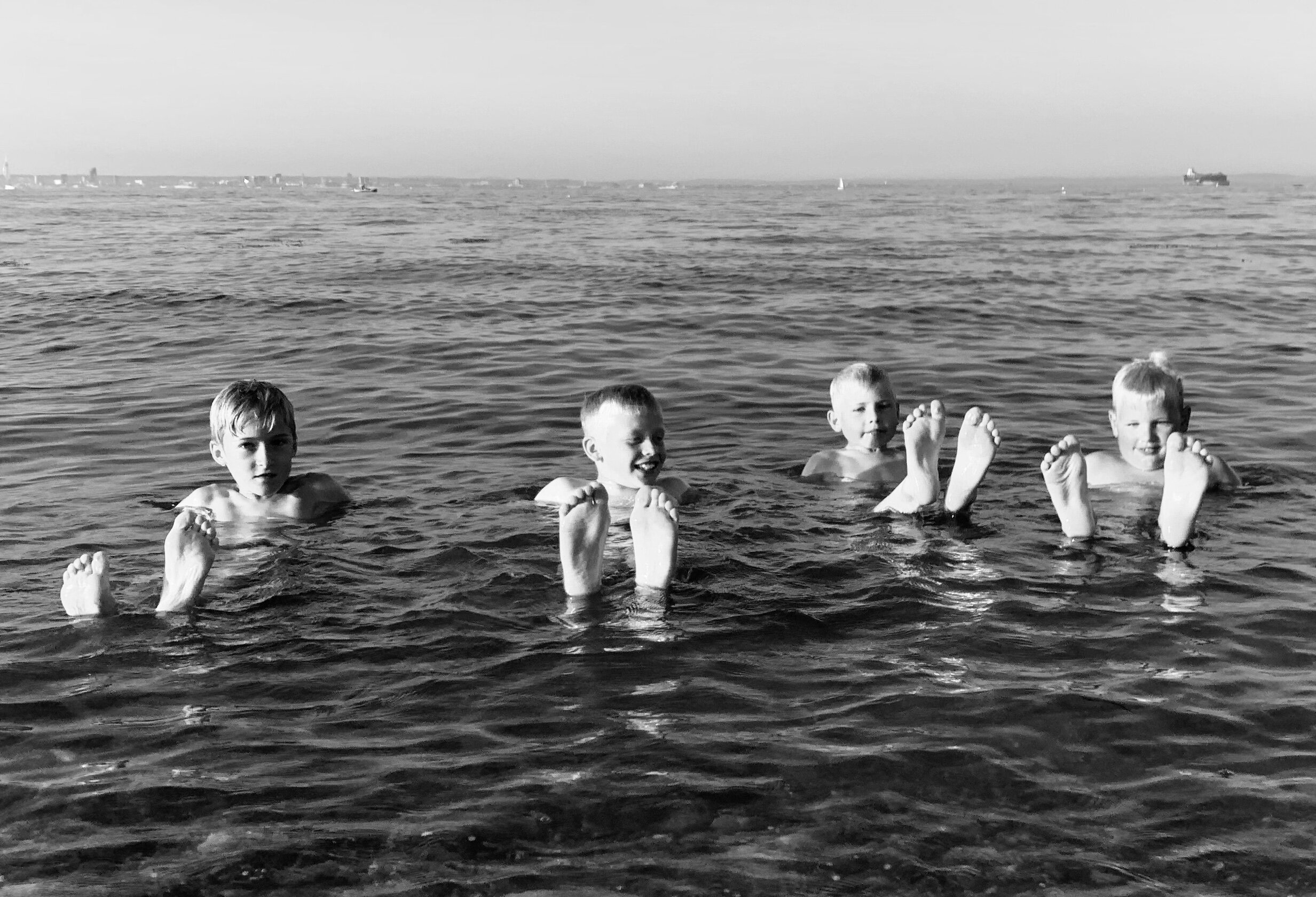 Boys Swimming in the Sea