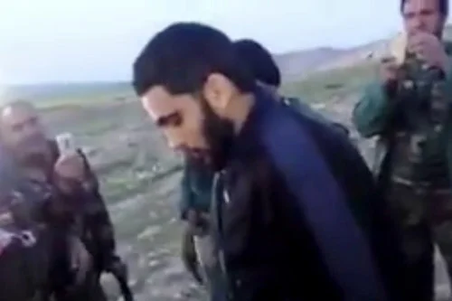 A photograph on social media shows a man the Kurdish military says is an American who turned himself in on Monday. Credit via Associated Press