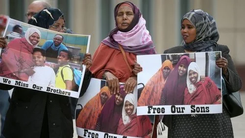 Family members and friends of the men on trial gathered outside the Minnesota courtroom. PHOTO: ELIZABETH FLORES