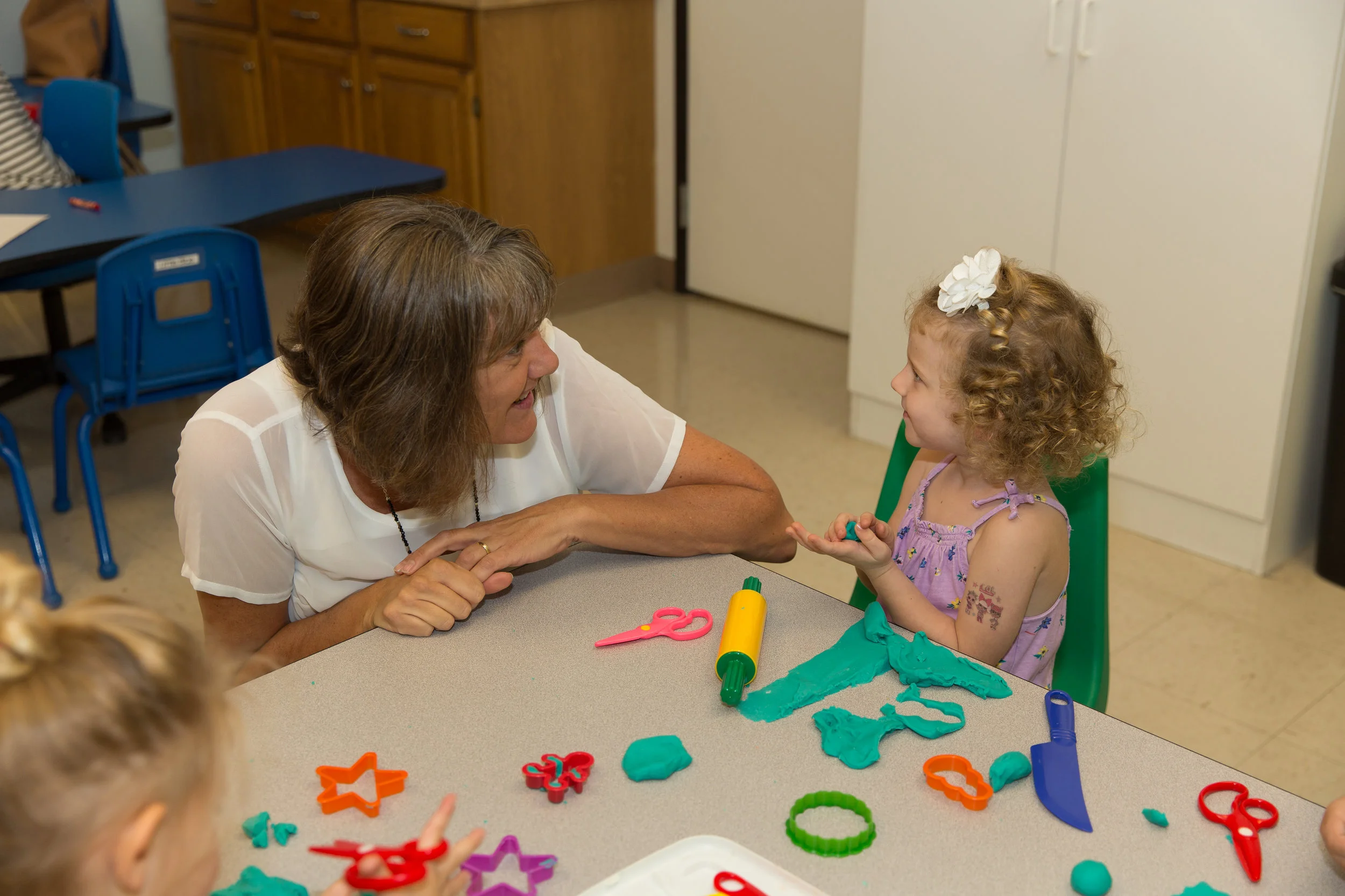 TeacherAndStudentPlayingPlaydough.JPG