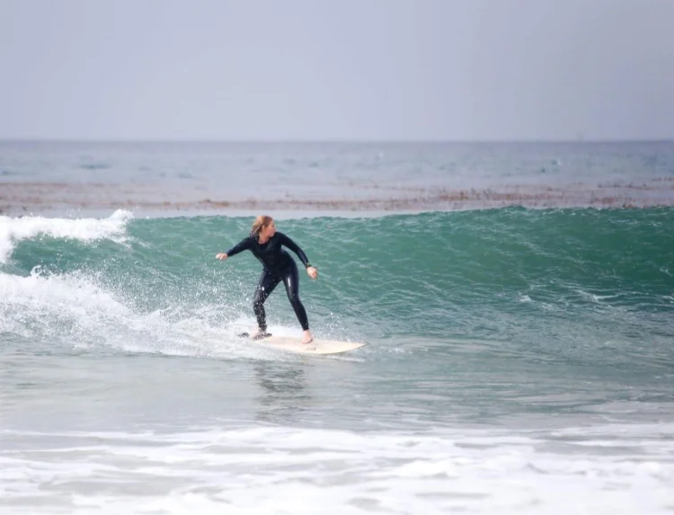 The author enjoying a wooden Firewire board and Yulex wetsuit. Photo: Kimber Rome