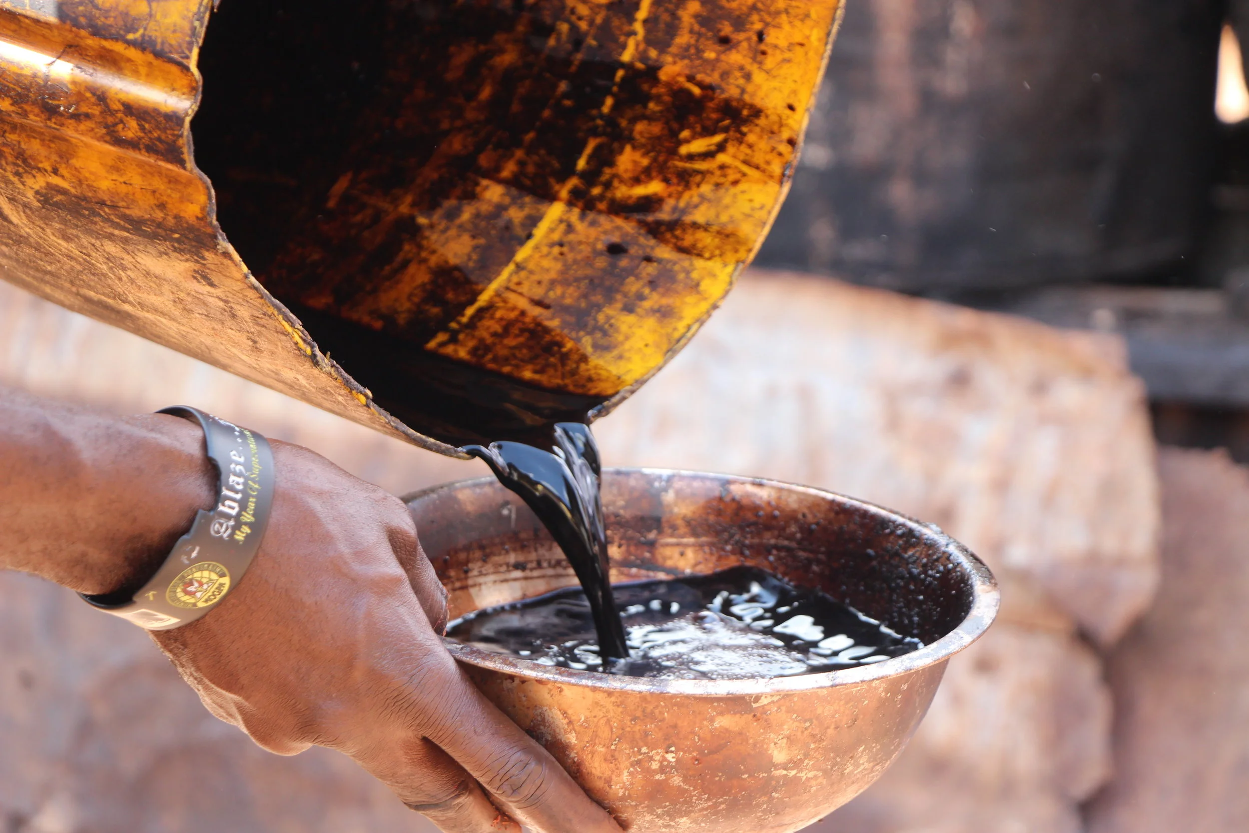 Dye mixing process at Adinkra Home Workshop, Ntonso Ghana